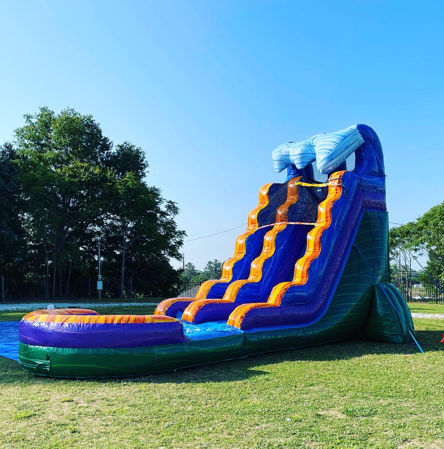 18 FT Tsunami Wave Waterslide Bounce House and Waterslide Rentals in