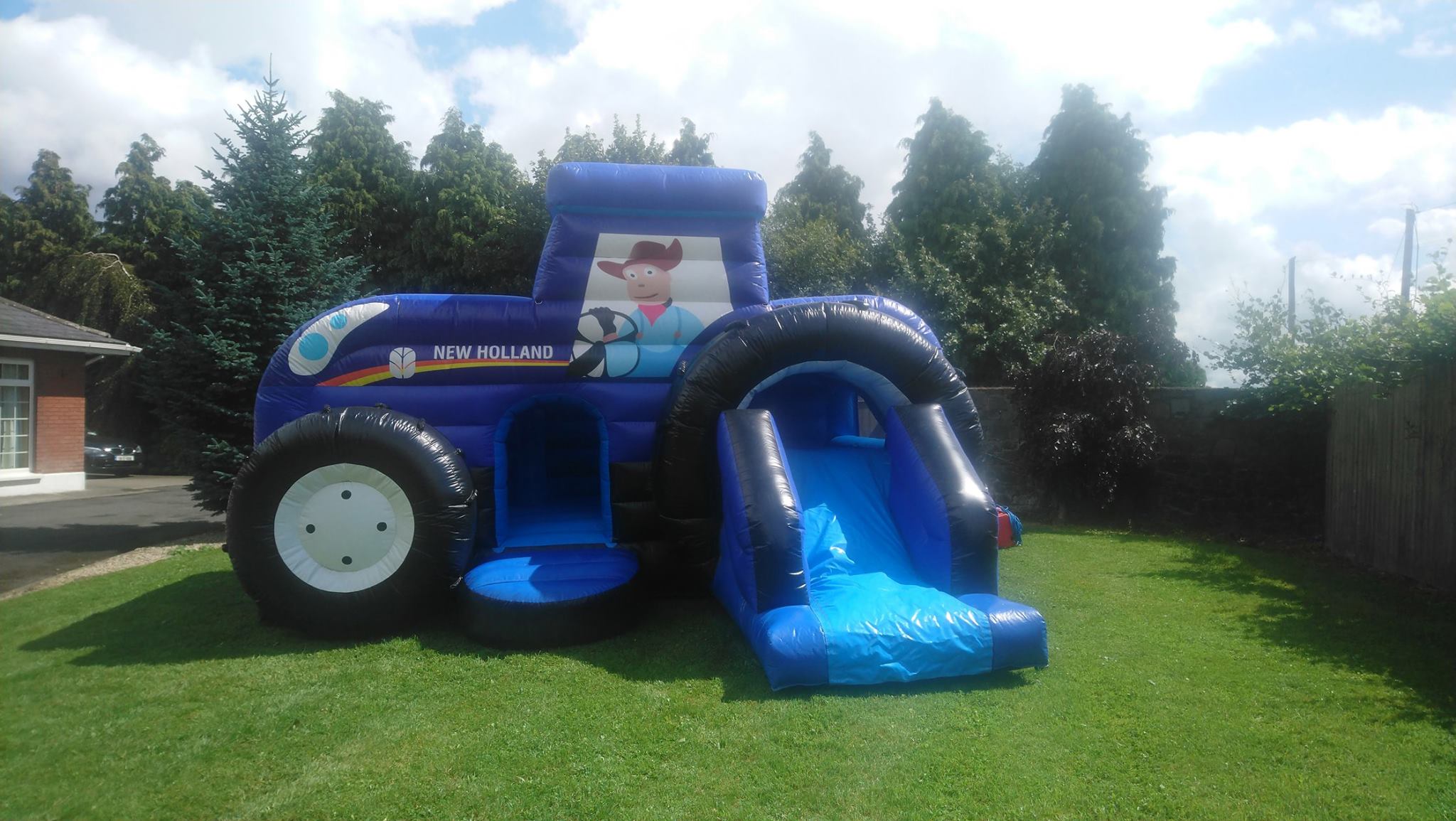 New Holland Tractor Themed Bouncy Castle & Slide 18ft X 14ft Best