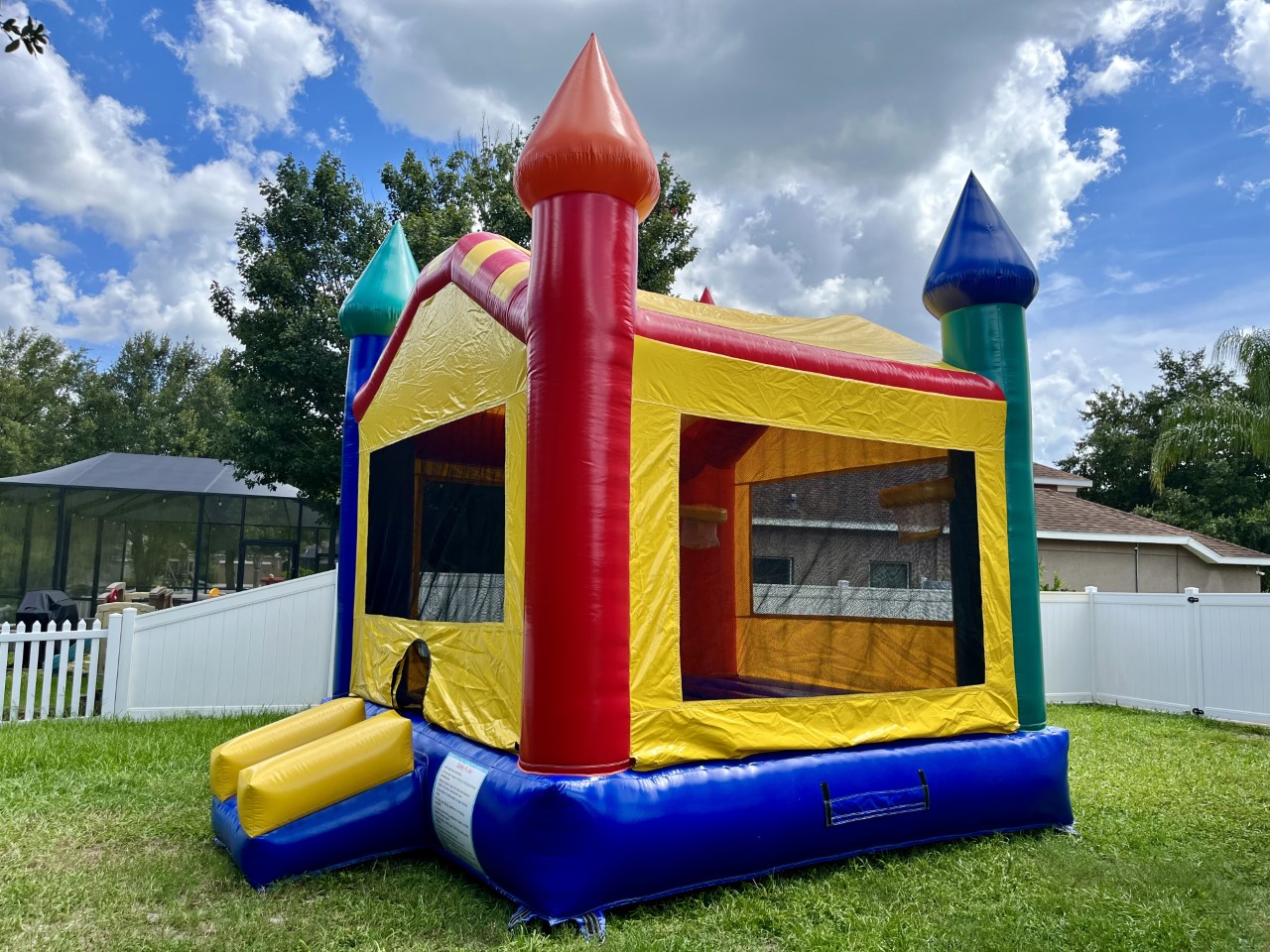 13x13 Primary Castle Bounce House Hire in FL