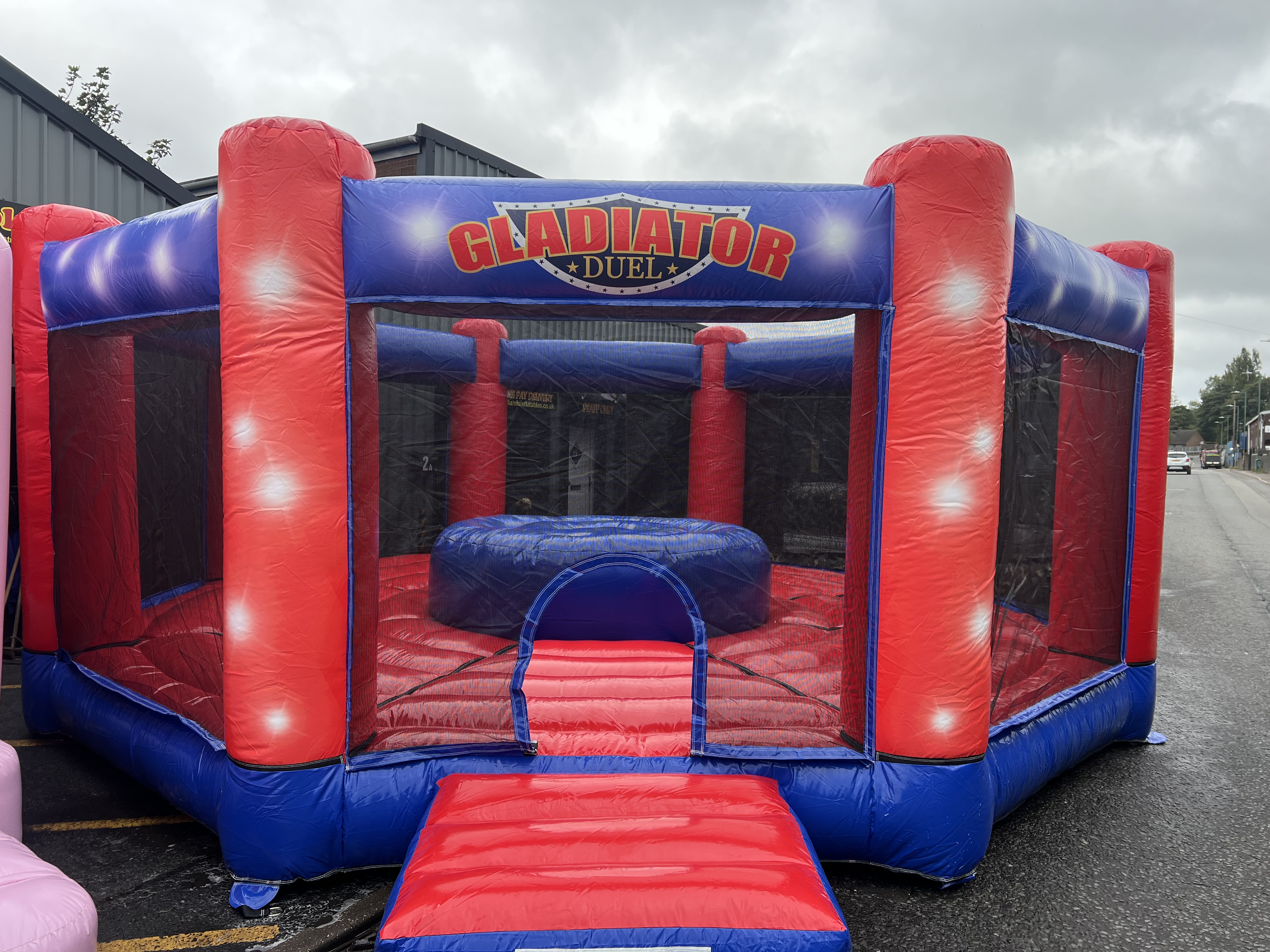 Red/Blue Gladiator Duel Arena Bouncy Castle Hire in Wolverhampton