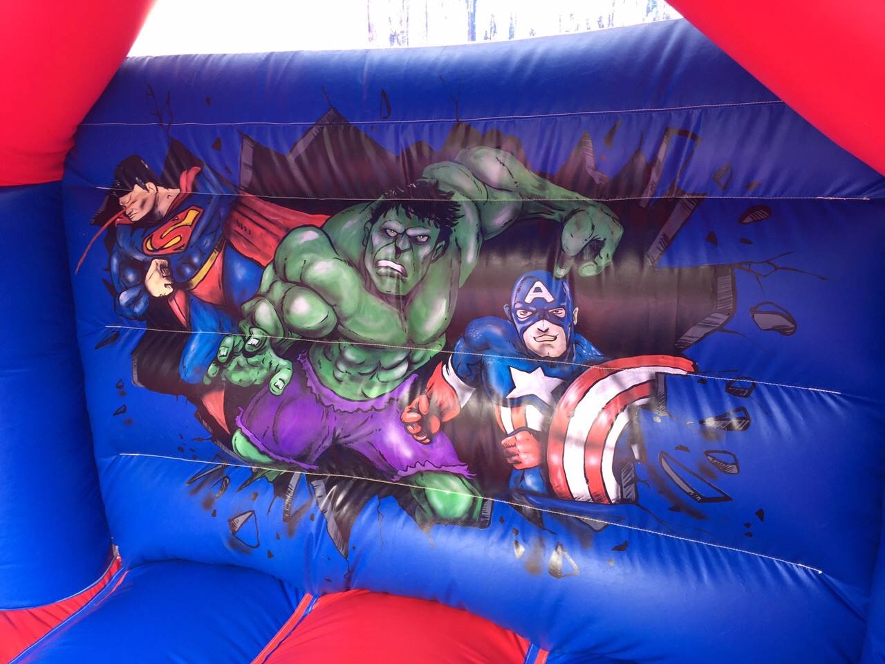 Super Hero Bounce And Slide Combo Best Bouncy Castle Hire service in Stroud, Gloucester