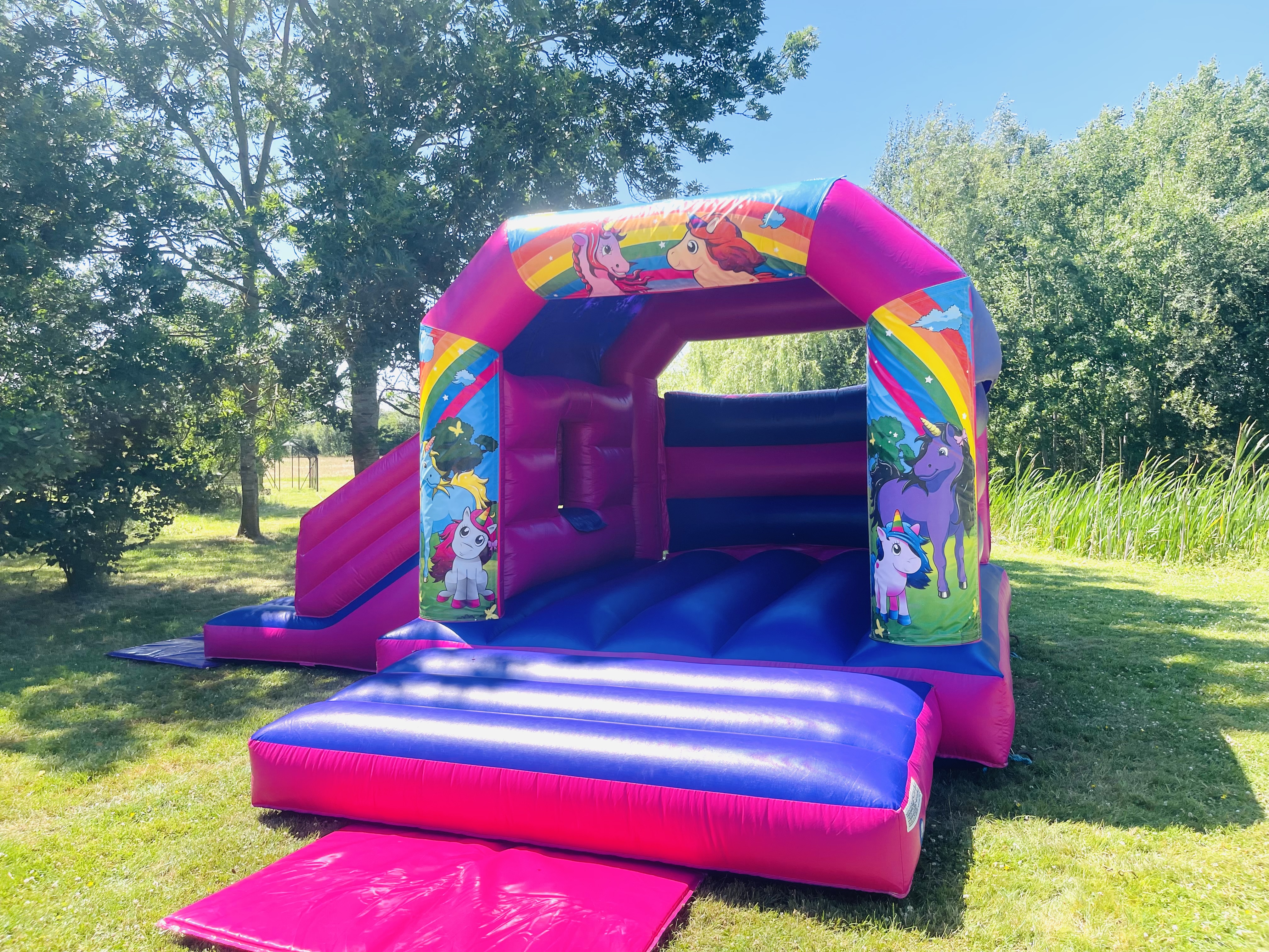 Unicorn Castle with side slide - Hire in Bicester | Bicester Inflatables