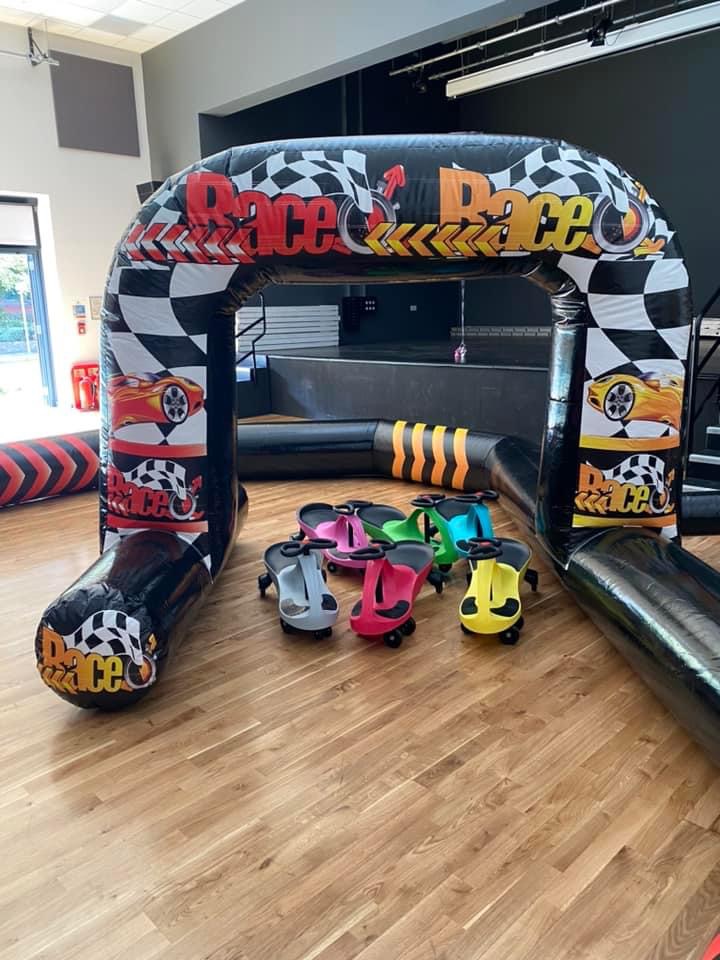 Didi Car Race Track with 6 Didi Cars 15ft x 20ft Bouncy Castle Hire in Aylesbury, Buckinghamshire
