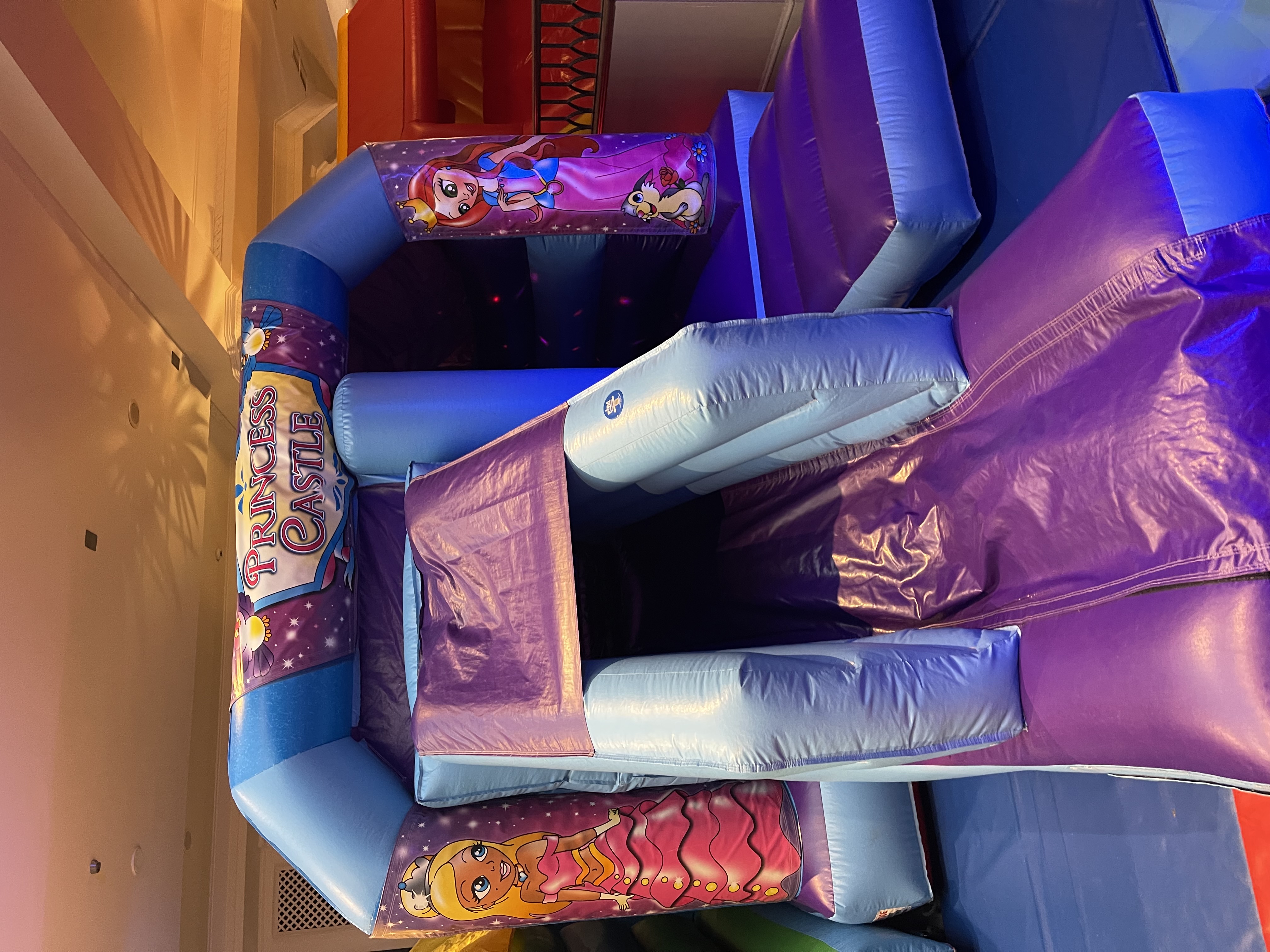 princess-themed-castle-bouncy-castle-party-hire-bucking-bronco-in