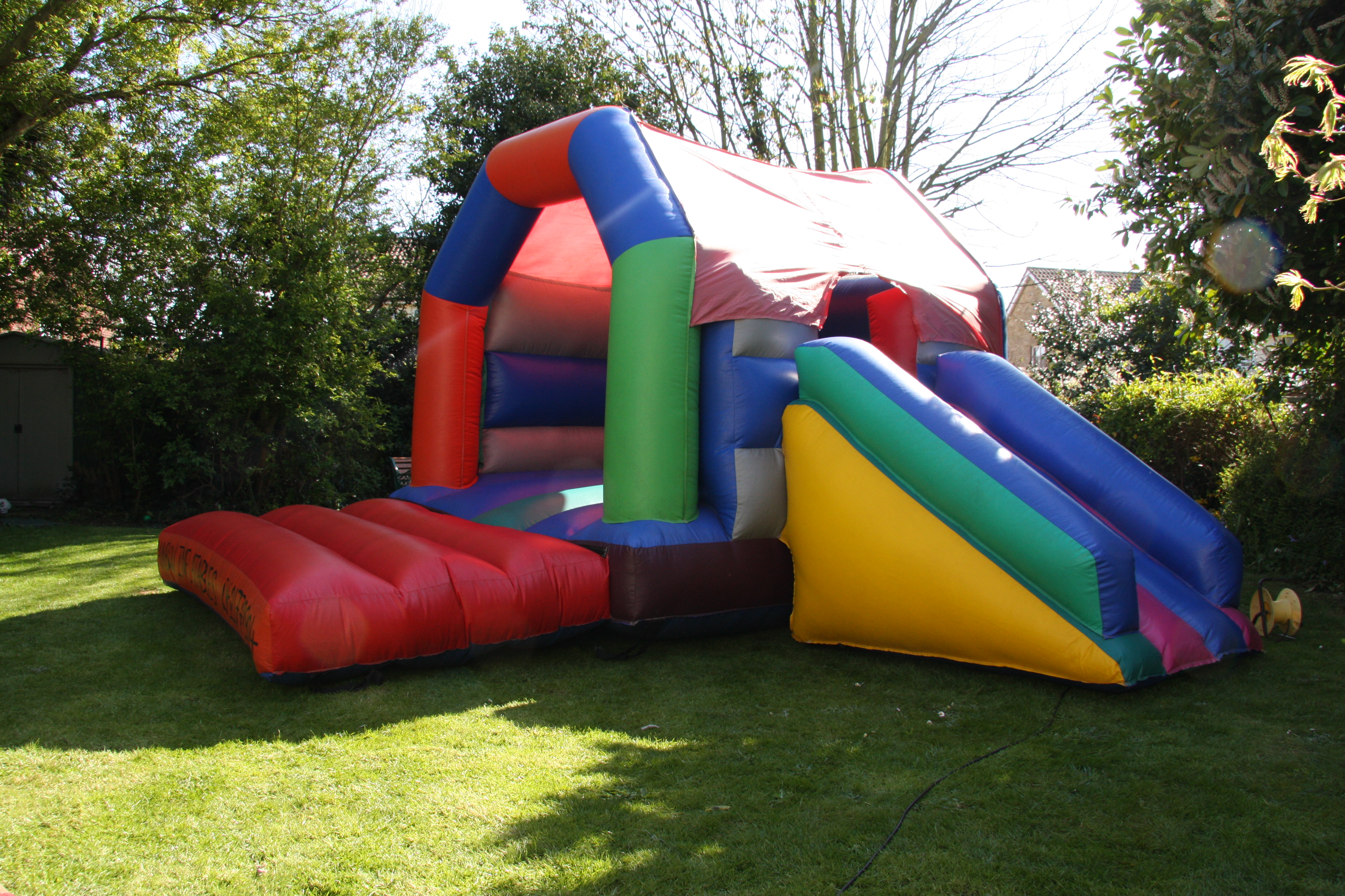 bouncy castle with slide to hire