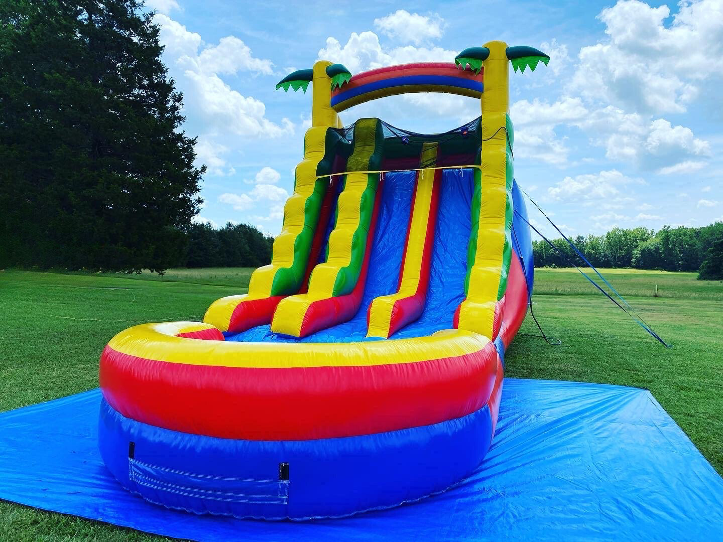 Rent Inflatable Rainbow 18 FT Rainbow Dual Lane Waterslide - Bounce House and Waterslide ...