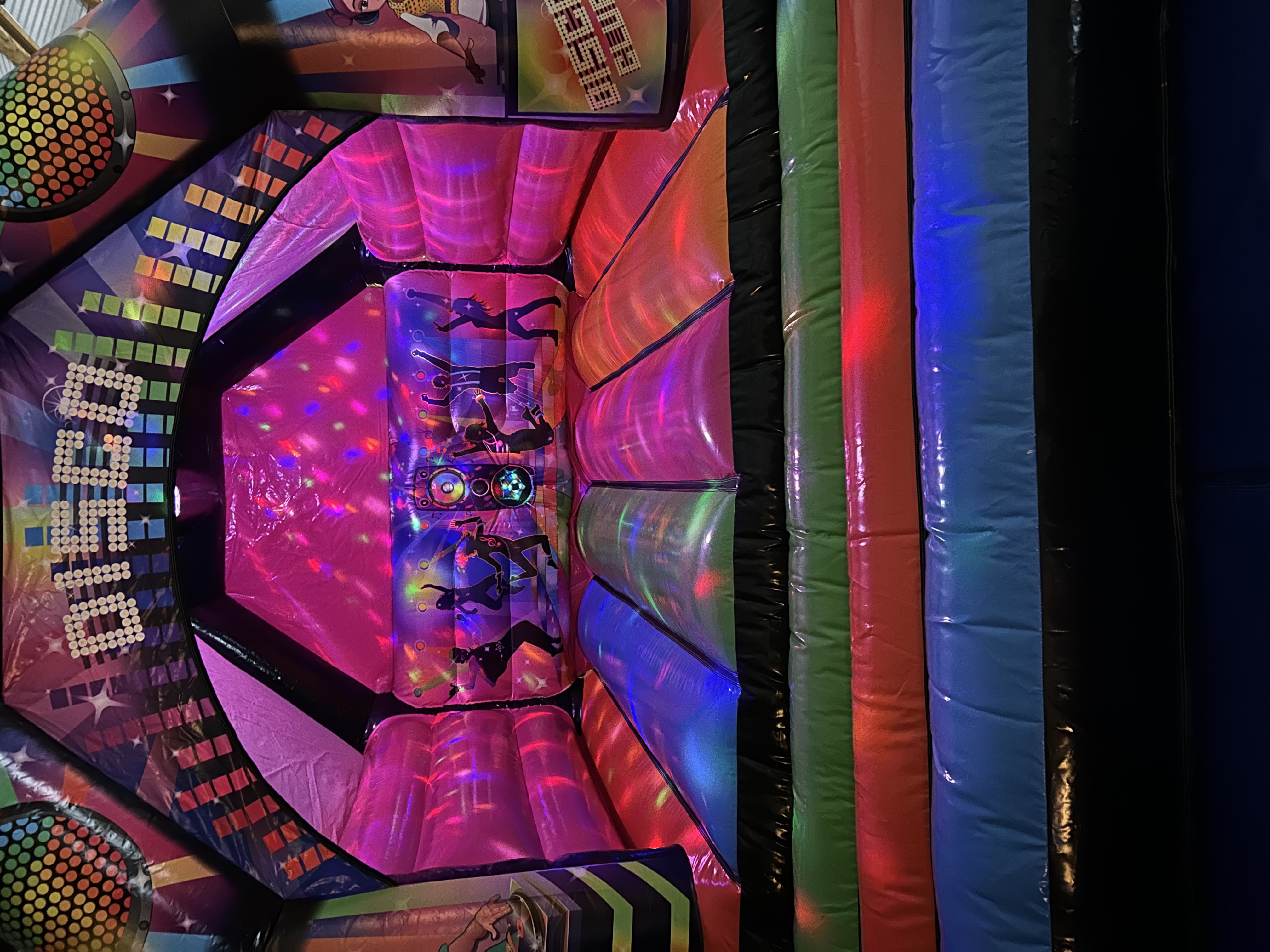 15X12 Multicoloured Disco bouncy castle - Bouncy Castle Hire in
