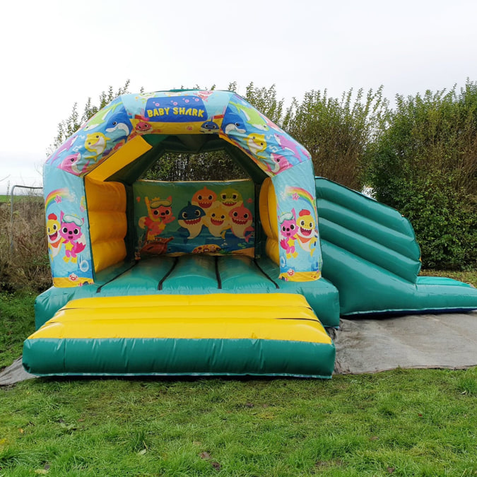 bouncy castle with slide to hire