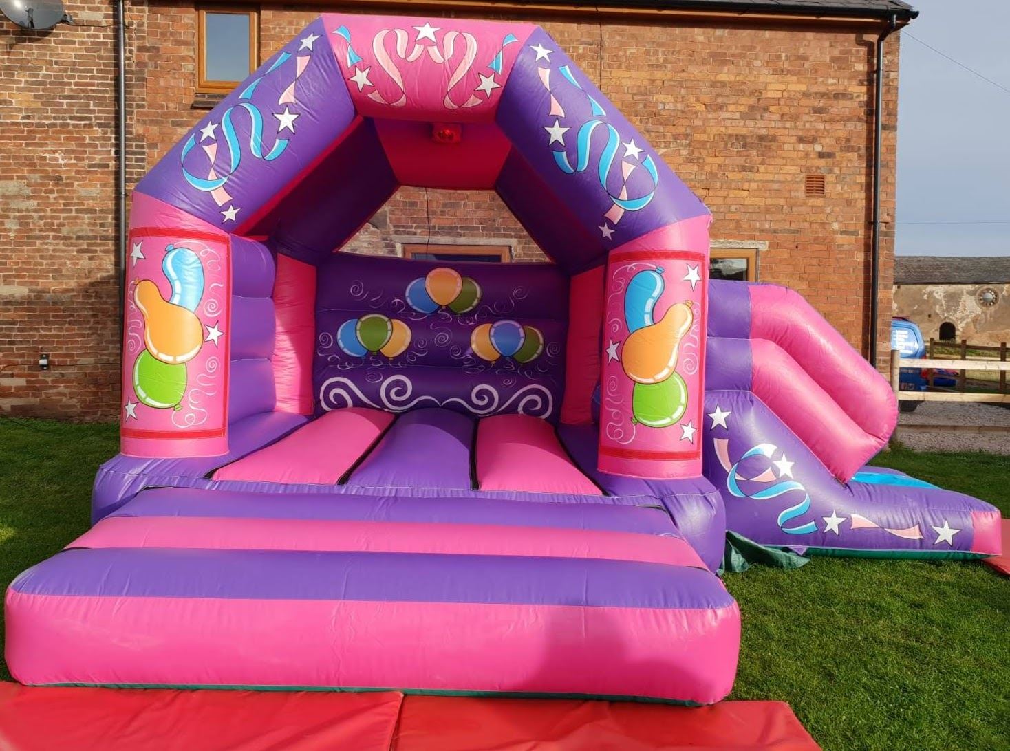 pink and purple bouncy castle