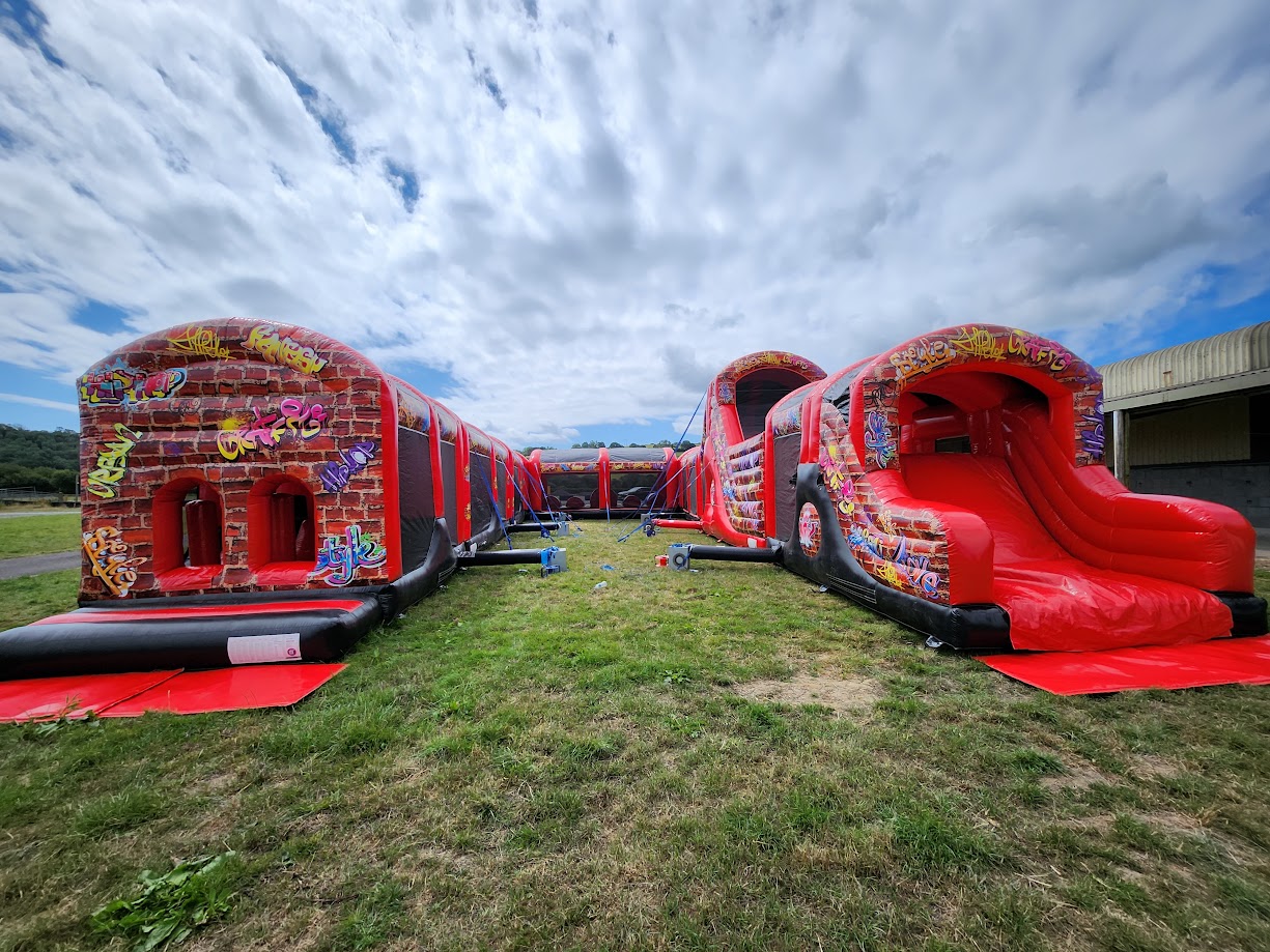 Santa Assault Course Assault Course Hire | Obstacle Course Wales | Fun Times Bouncy Castle