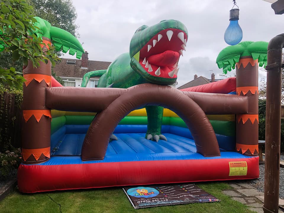 Dinosaur bouncy castle hire Package hire events Wirral
