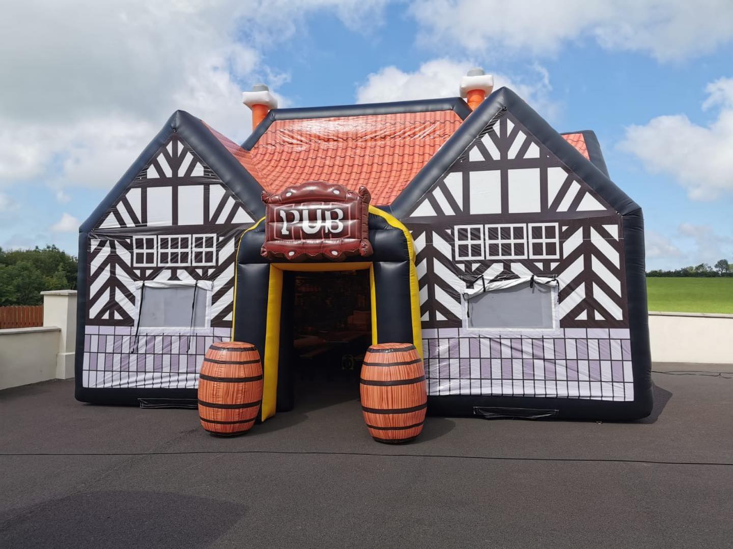 Inflatable Pub Hire 8x5 Metres (Orange and White) Hire in Co.Down and