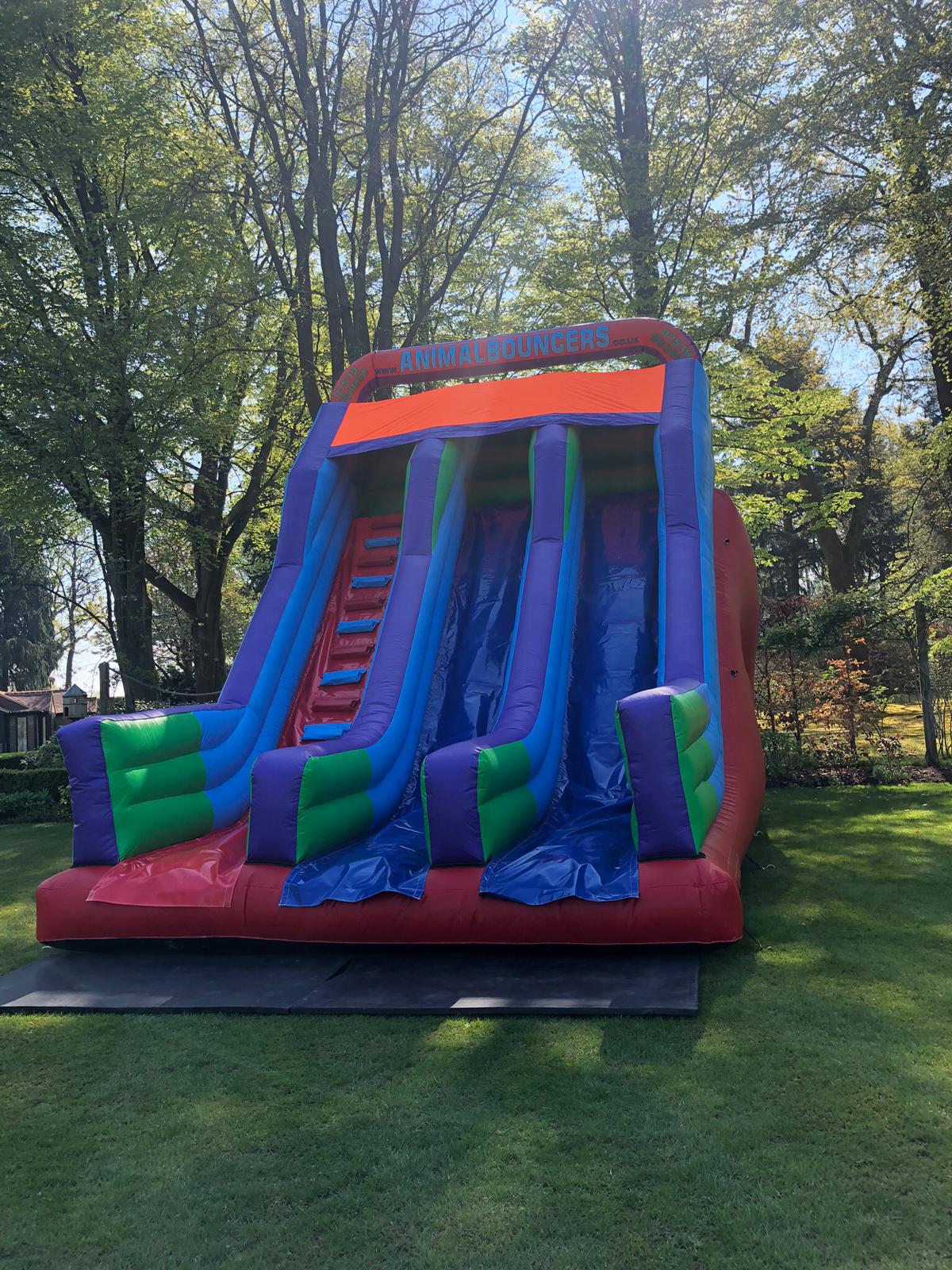 12ft Platform Twin Lane Rainbow Slide - Bouncy Castle Hire, Fairground ...