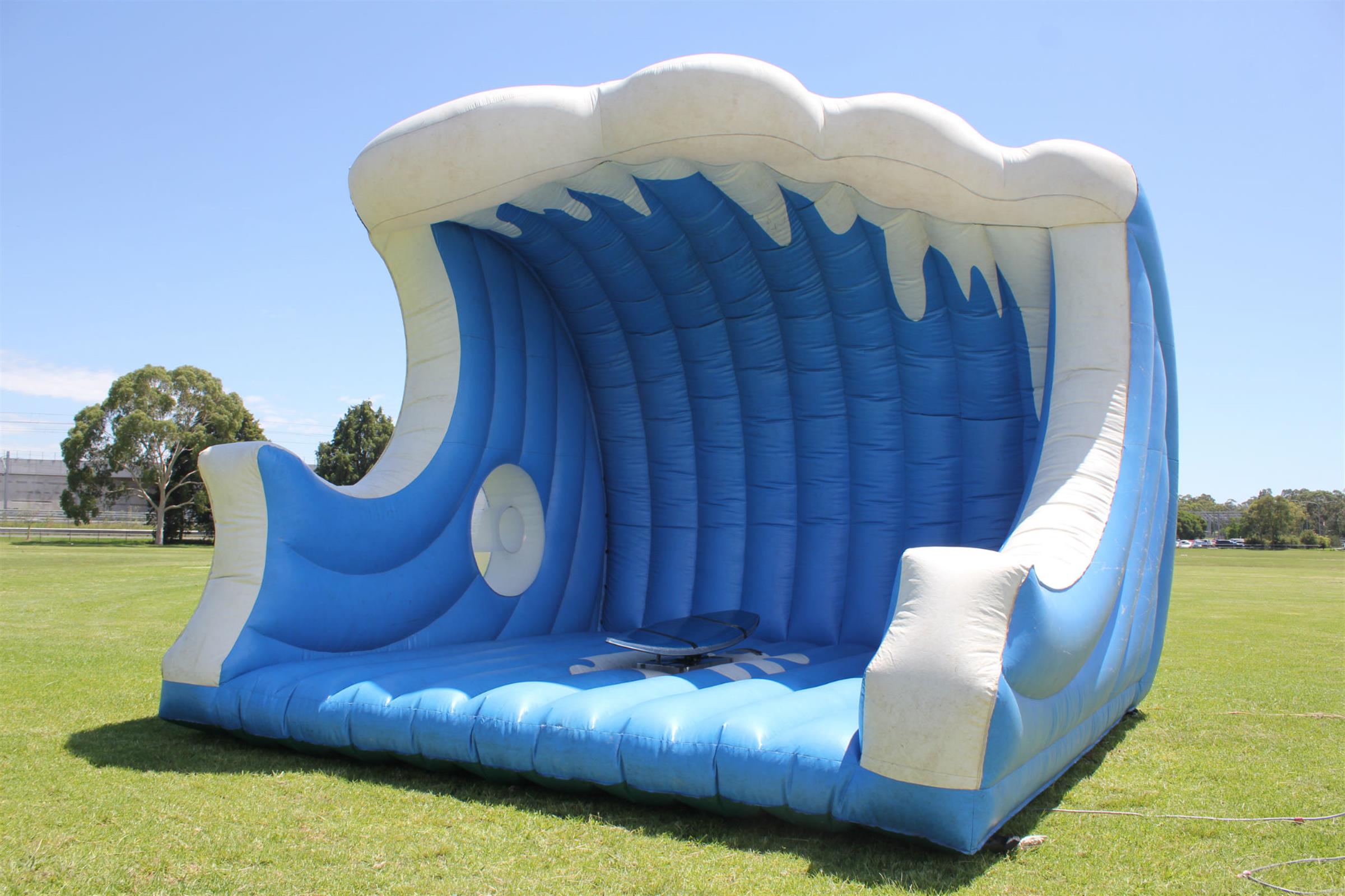 Mechanical Surfboard and Wave Inflatable Jumping Castle Hire in Sydney