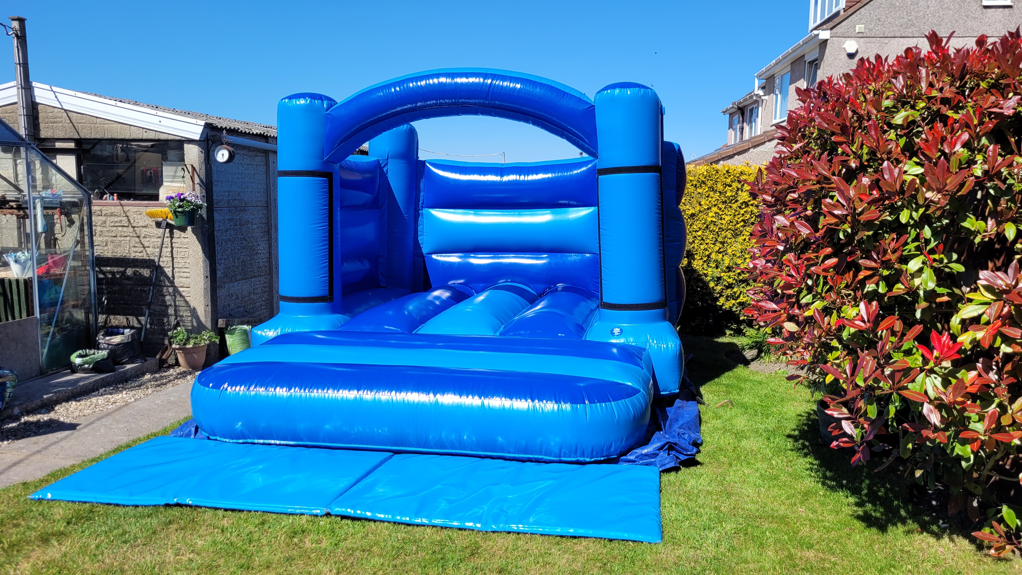Blue Low Height Bouncy Castle Hire | Safe & Fun Inflatable for Kids