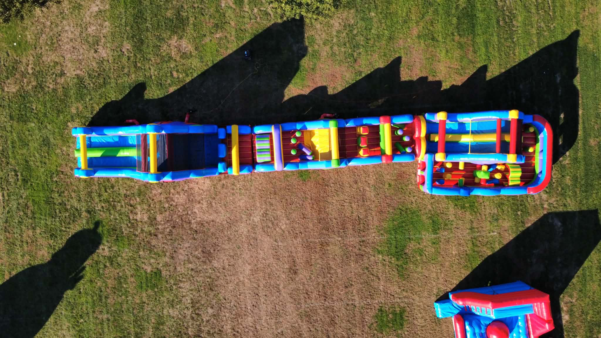 Trackless Train For Rent 110-Foot Retro Obstacle Course - Inflatable and Amusement ride Rentals ...