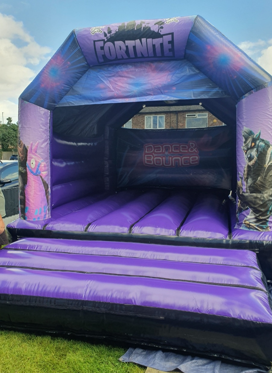12 ft by 15 ft Fortnite castle Bouncy Castle Hire in Warrington, St