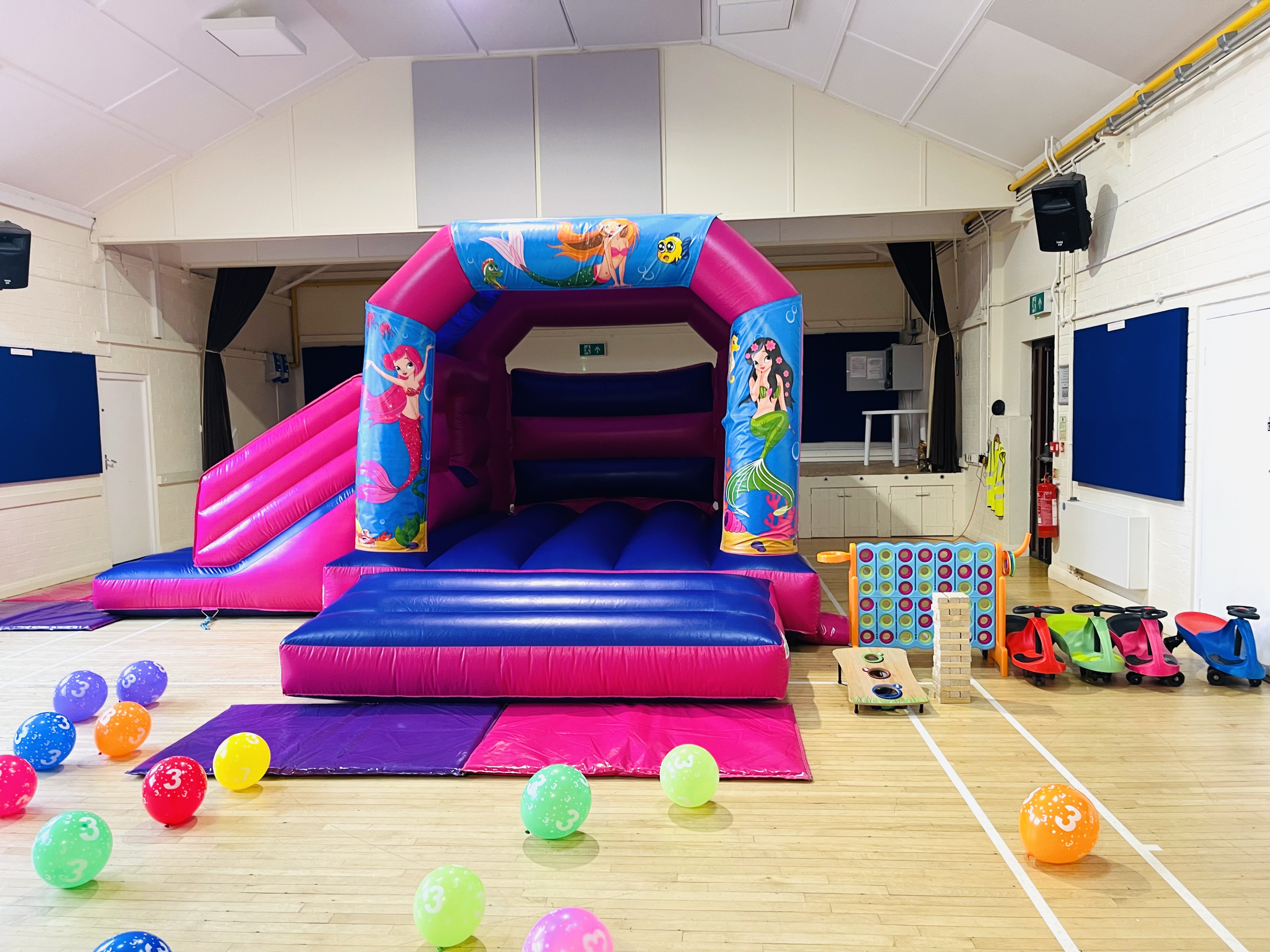 Mermaid Castle with side slide - Hire in Bicester | Bicester Inflatables