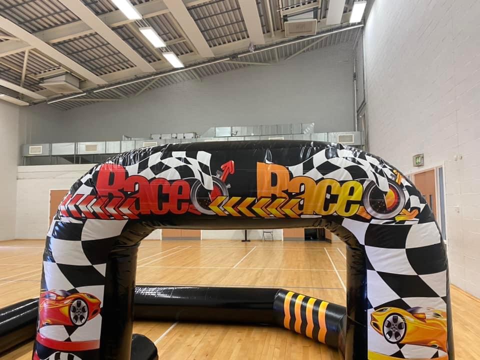 Didi Car Race Track with 6 Didi Cars 15ft x 20ft Best Bouncy Castle Hire service in Aylesbury