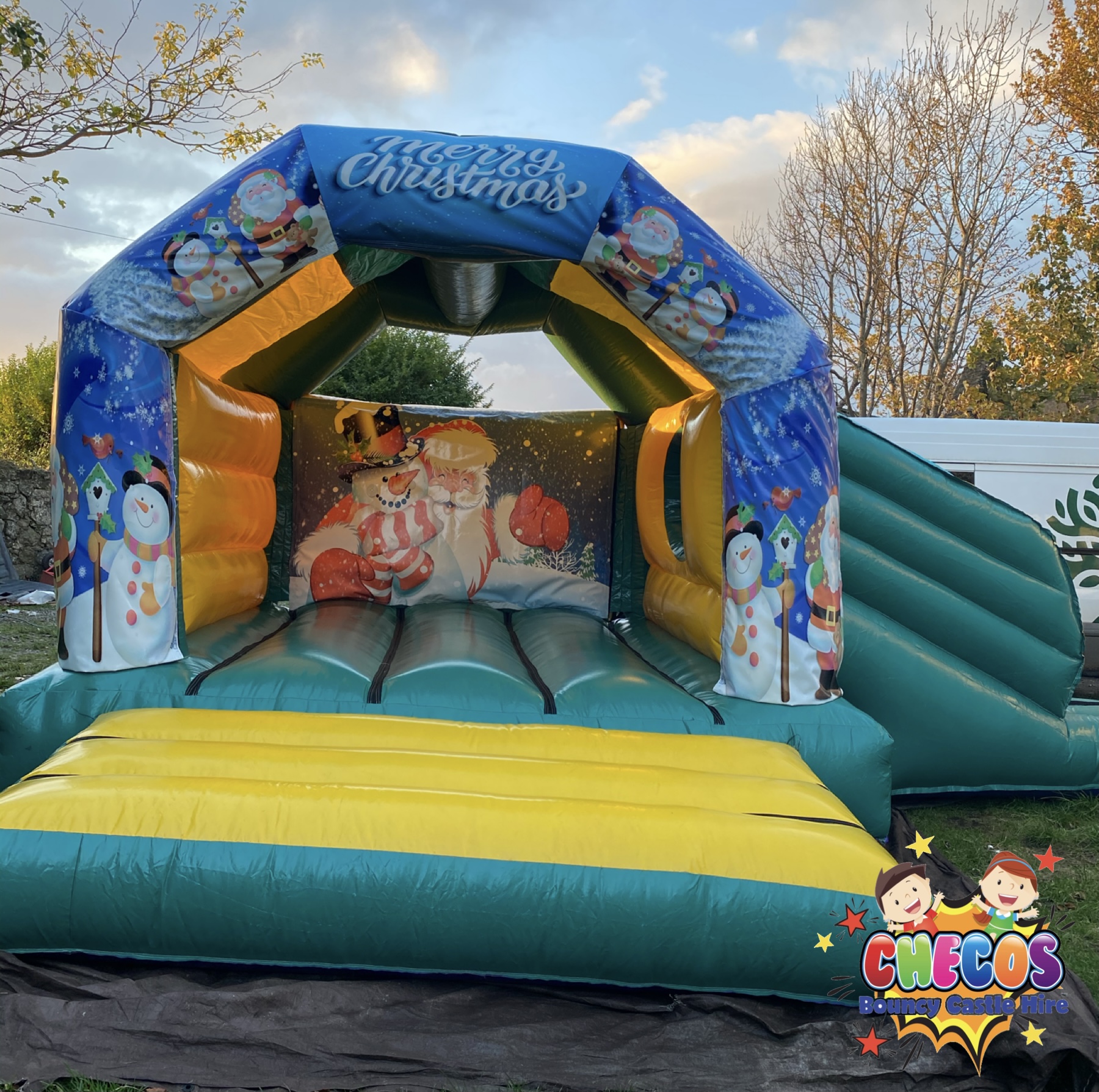 18ft x 15ft Merry Christmas Combo bouncy castle Bouncy Castle Hire