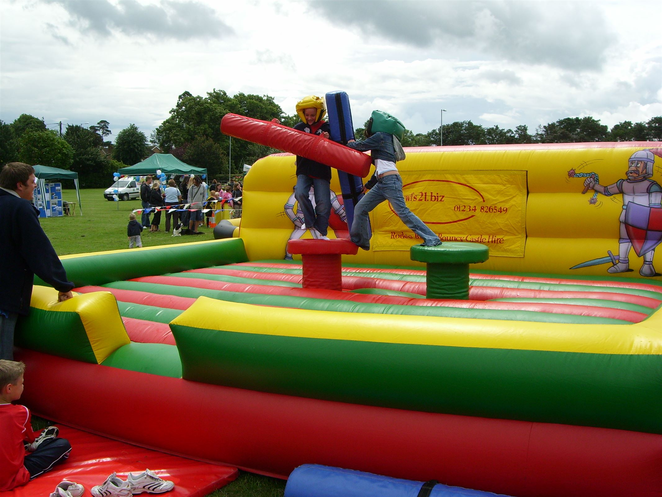 Large Inflatable Gladiator Bouncy Castle Hire in Bedford, Milton
