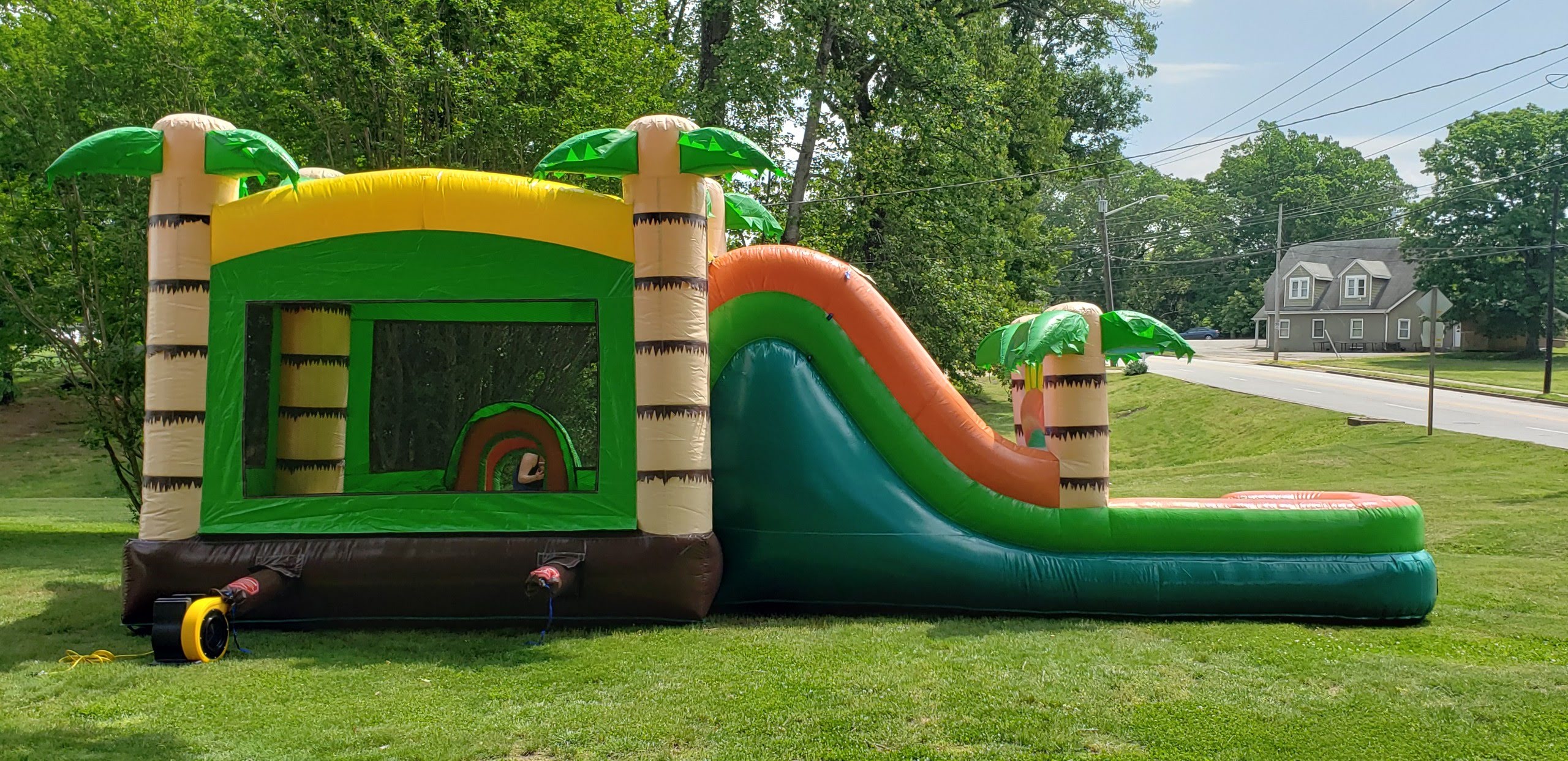 Mega Tropical Slide with Landing Pad Best Bounce House Rentals
