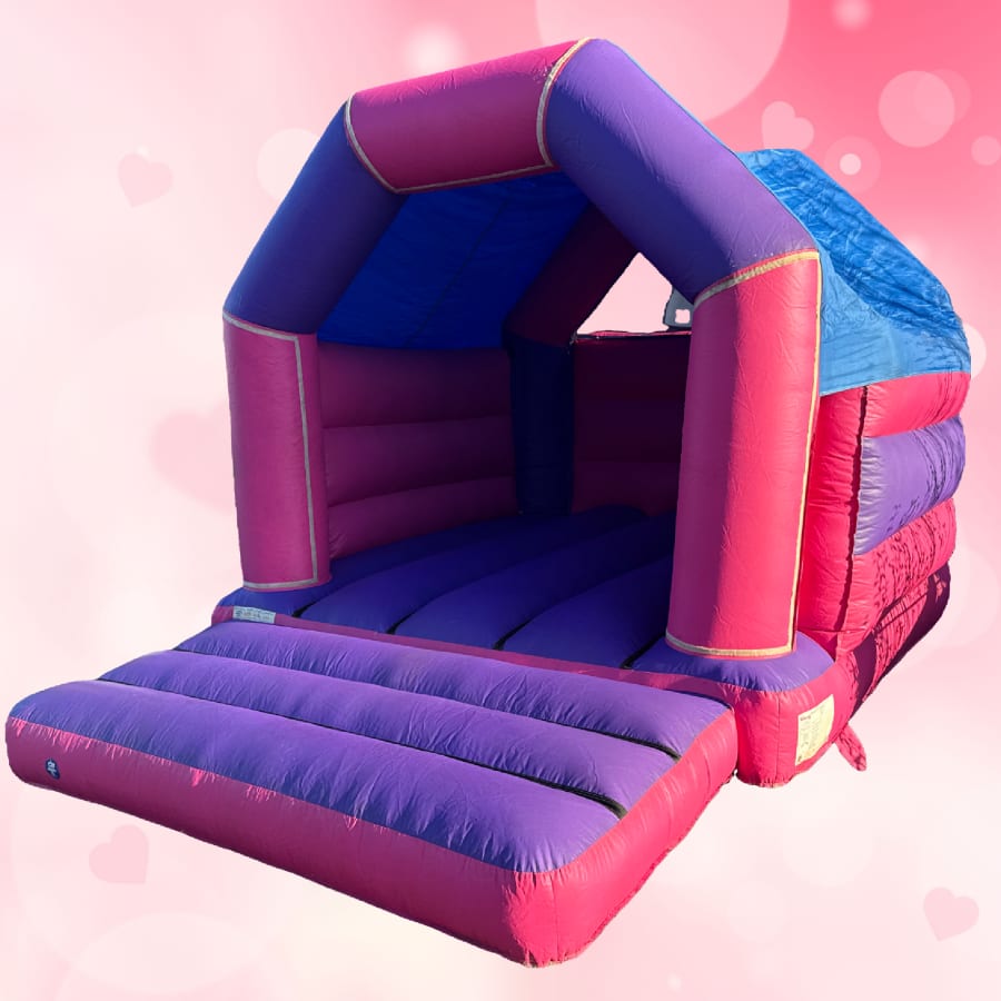 Pink and Purple 12ft x 15ft Bouncy Castle - bouncy castle hire Birmingham
