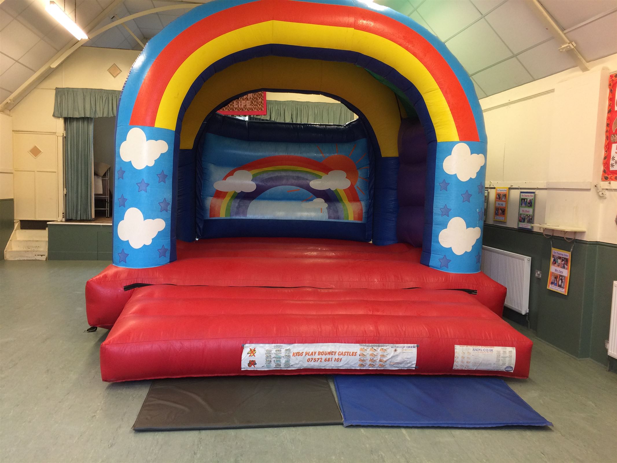 rainbow bouncy castles