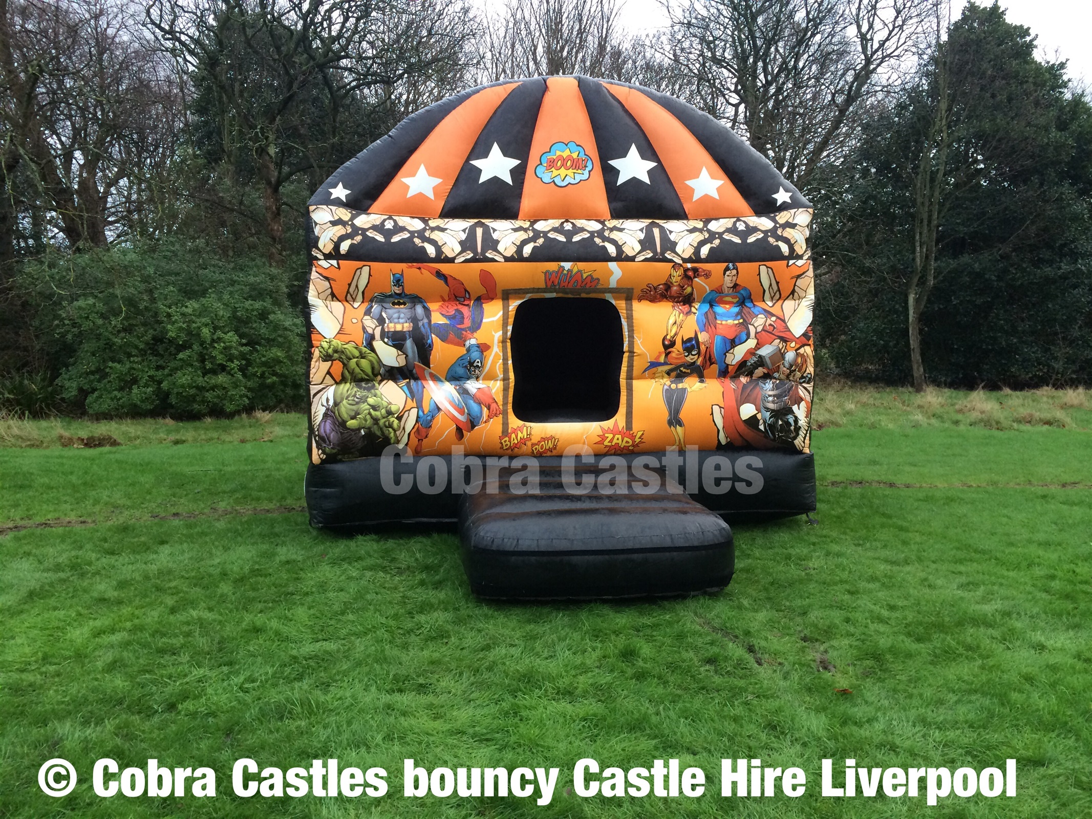 Orange & Black Superheroes 12x16 Disco Dome Bouncy Castle Hire in