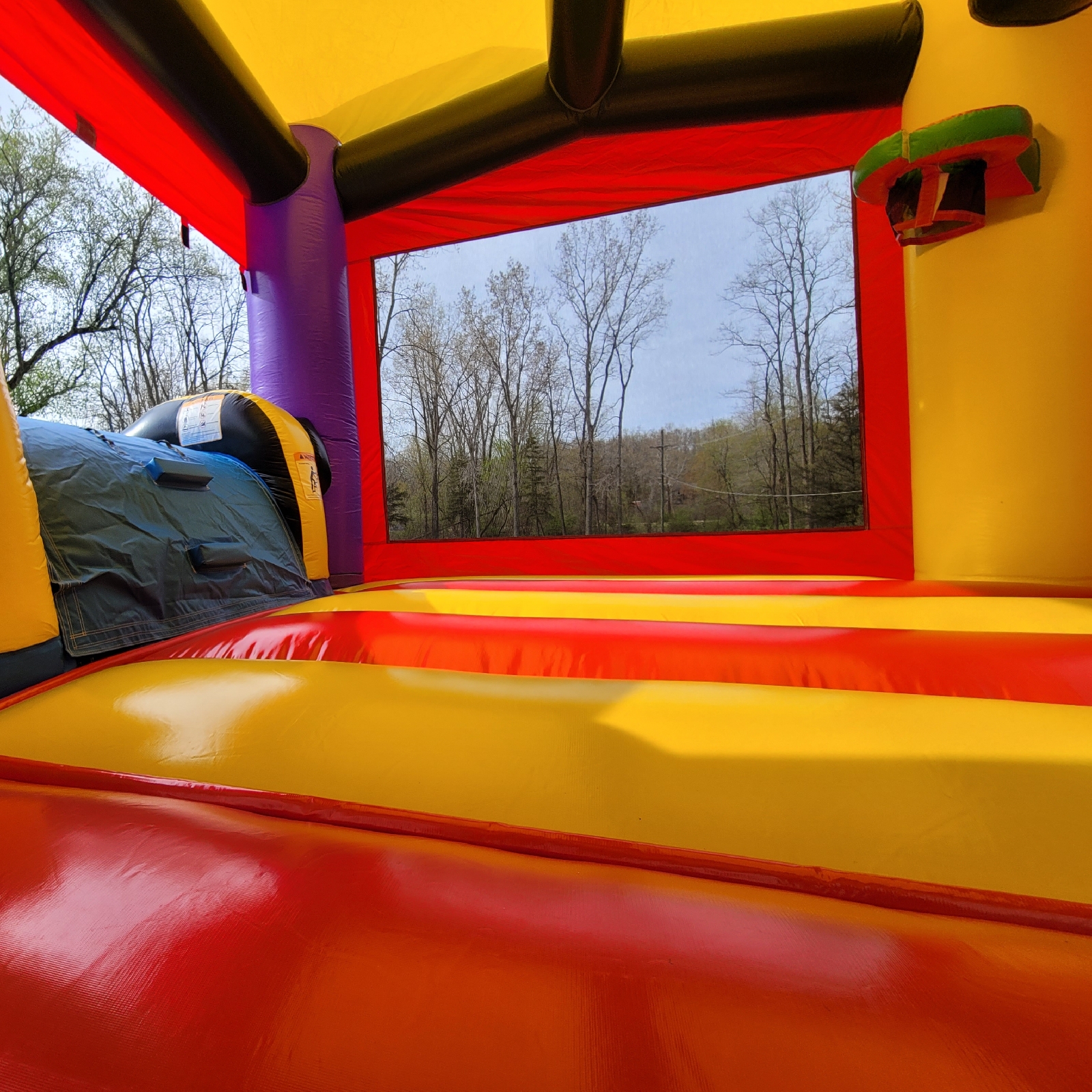 Ninja Warrior Bounce House With Slide Hire in Michigan