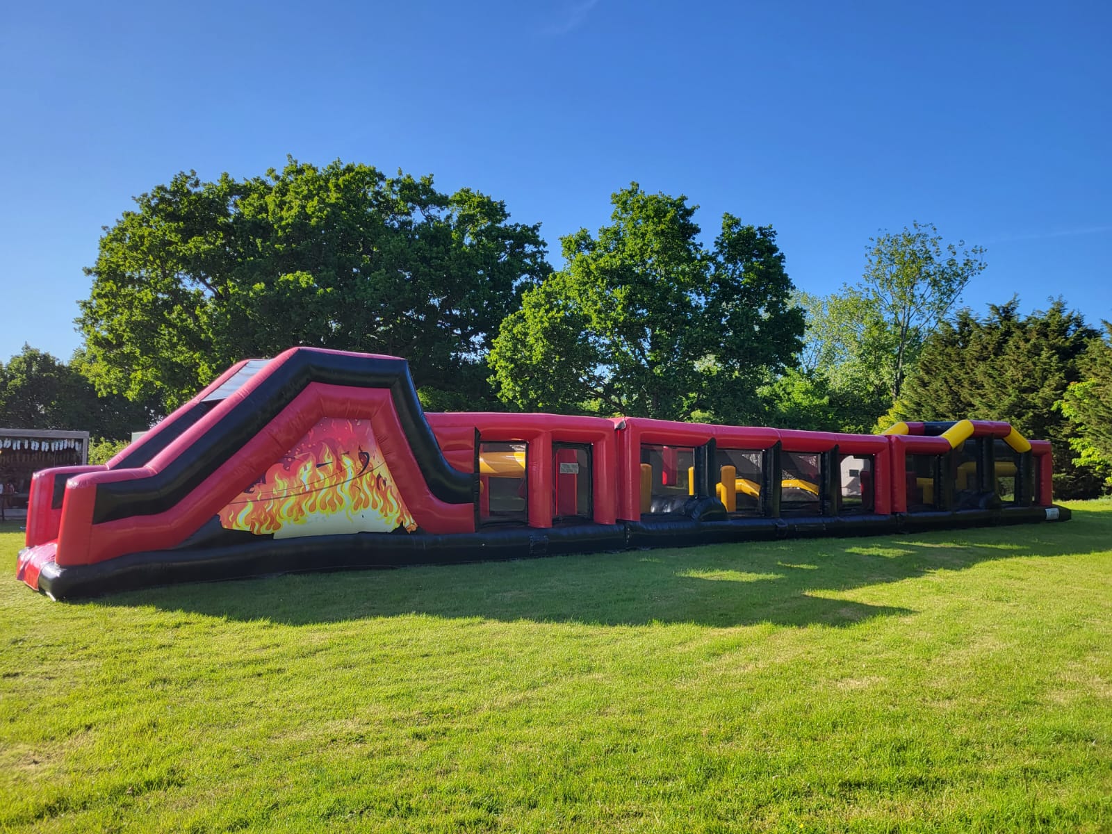 Assault Course Inflatable Burning Flames theme 90ft x 10ft - Bouncy ...