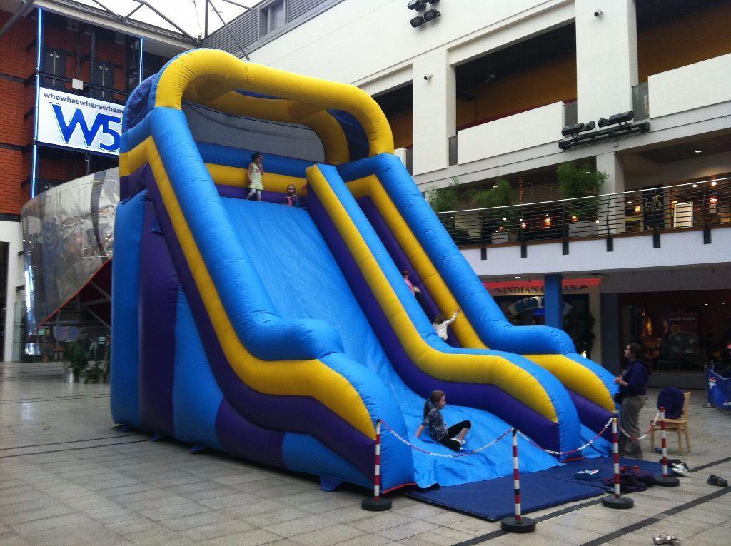 bouncy castles with slides for hire