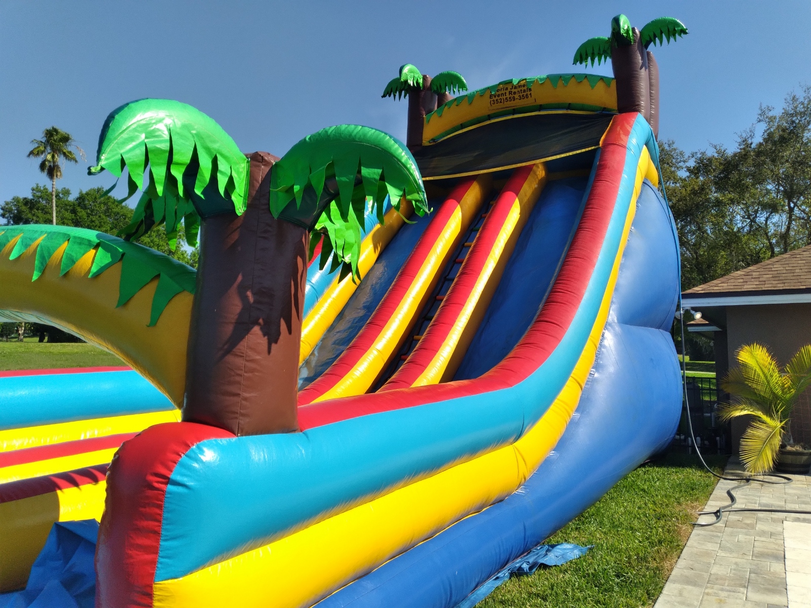 Tropical 21ft double lane slide - Hire in FL | Gloria James Event