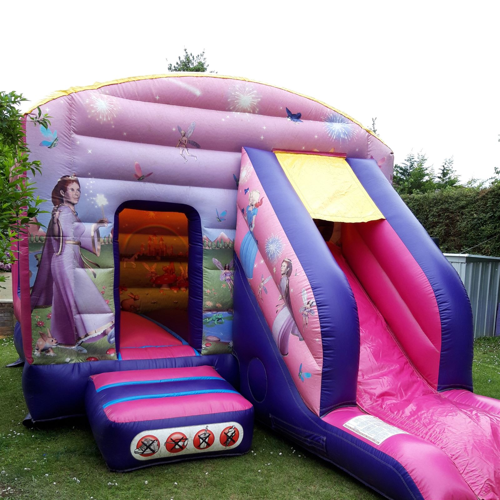 Pink princess bouncy sales castle