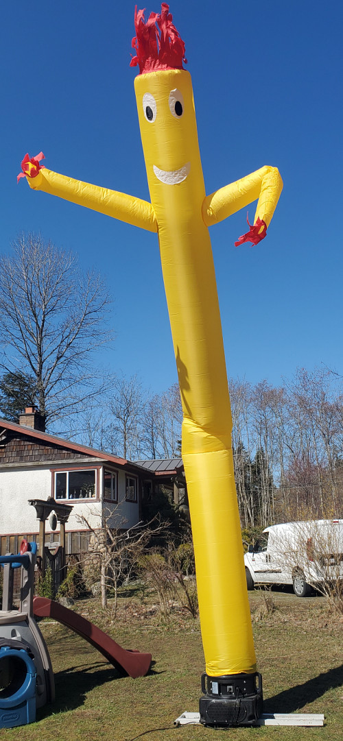 yellow wavey inflatable man Bouncy Castles and party rentals in