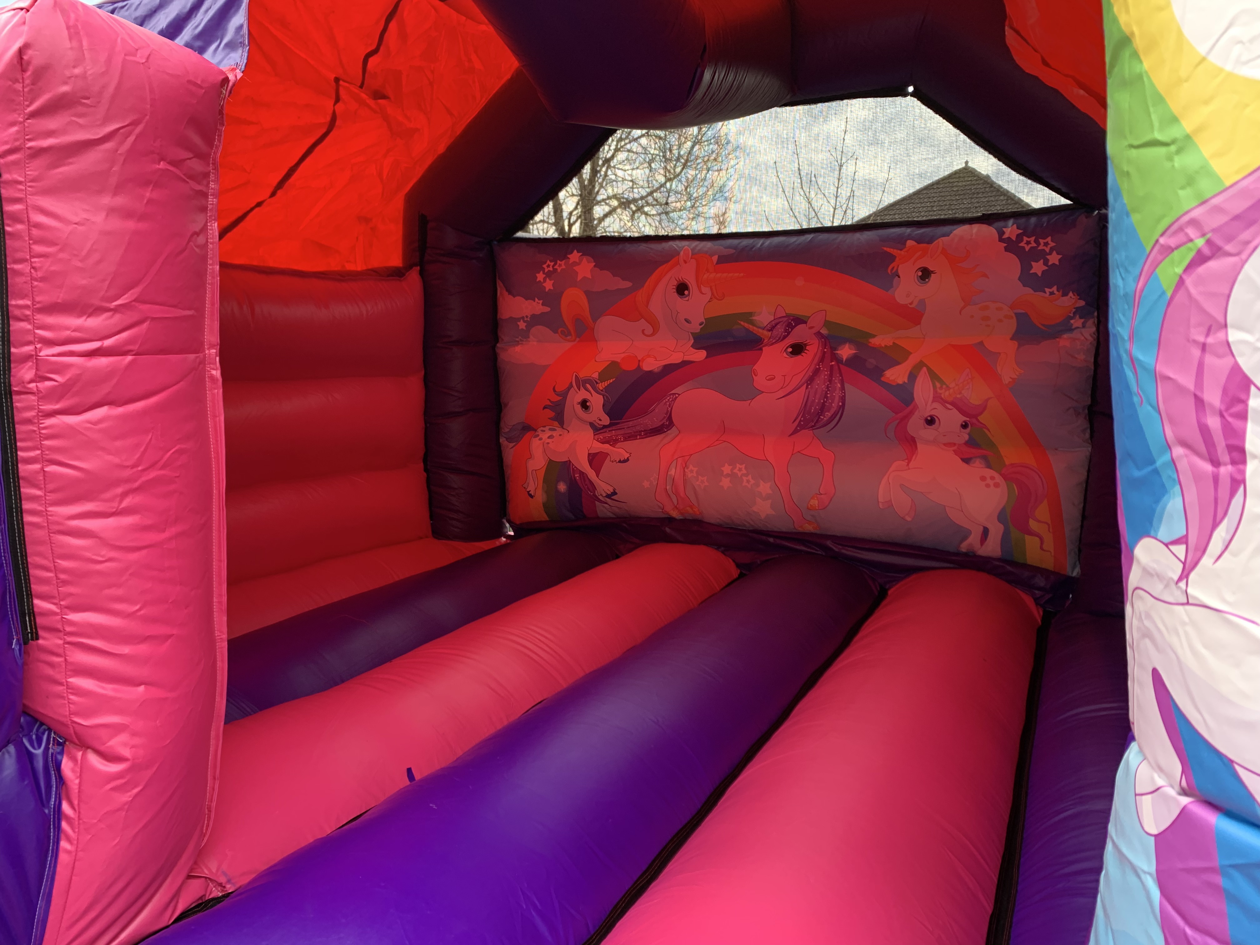 12ft x 18ft Unicorn Castle with Slide Best Hire service in East