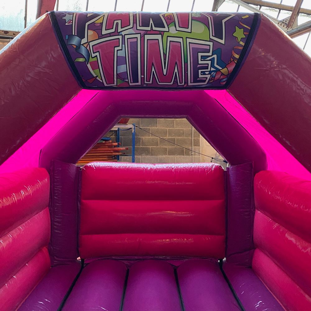 pink and purple bouncy castle