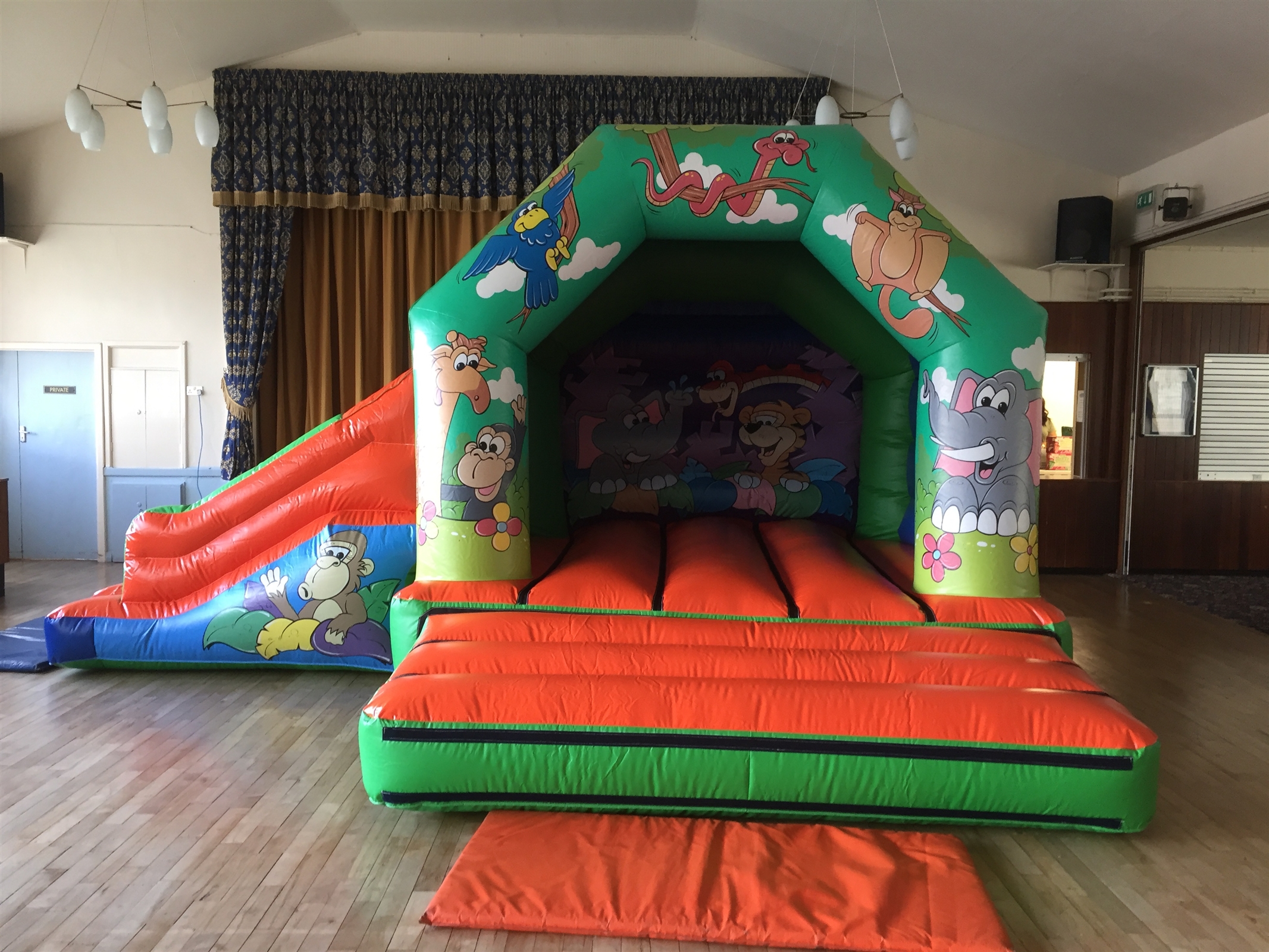 Jungle Castle and Slide - Bouncy Castle & Inflatable Hire in Stoke on