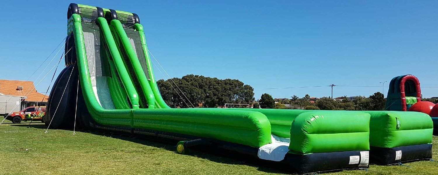 Dual Lane Edge Massive Water Slide - Jumping Castle Hire in Perth