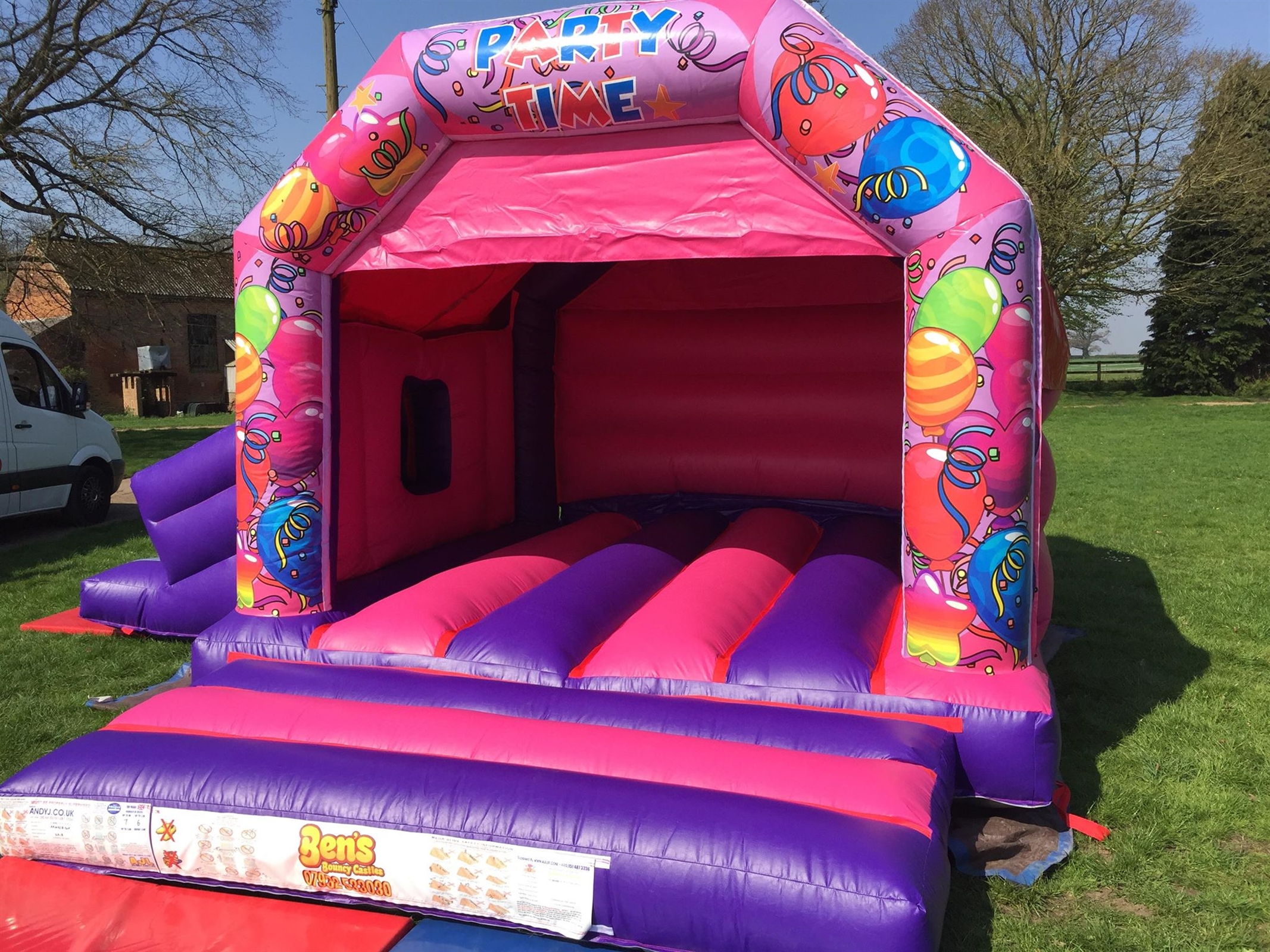 Pink Celebration Bounce and Side Slide Bouncy Castle Hire, Bouncy