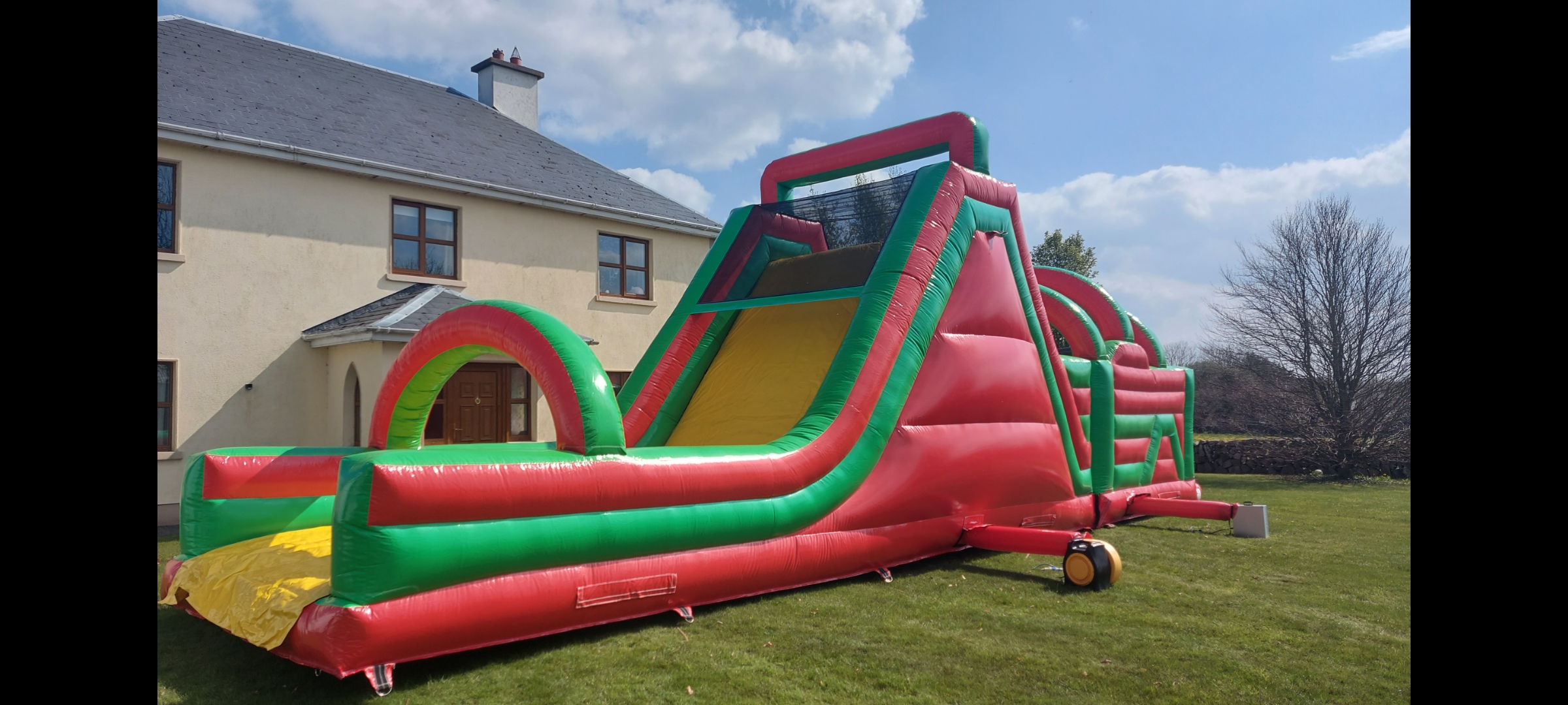 Juice slide obstacle course 50 x 12 feet Bouncy Castle Hire, Quad