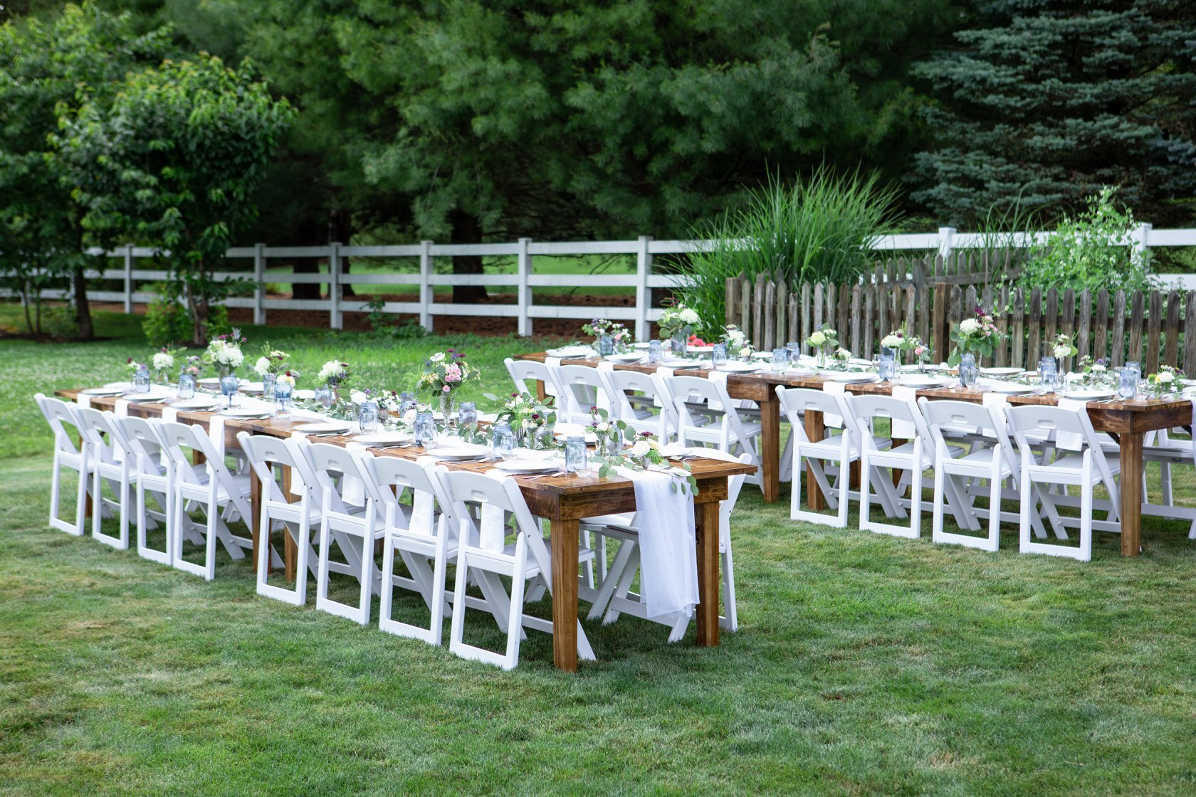 5 Long & 30 White Resin Chairs Table & Chair Rentals in Detroit & Surrounding Areas