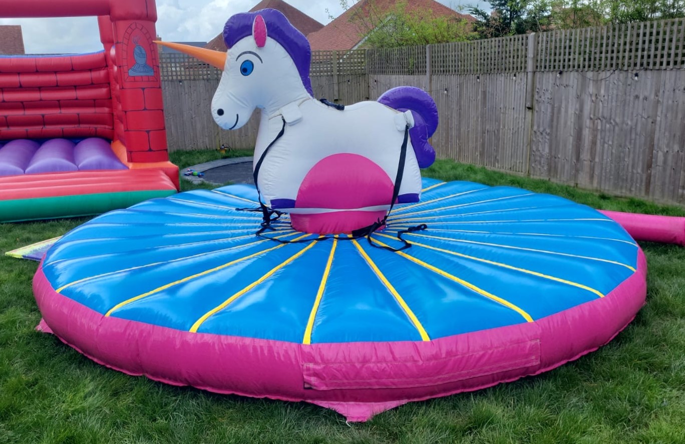 Rodeo Pull Unicorn themed Inflatable Game 16ft Diameter Bouncy Castle