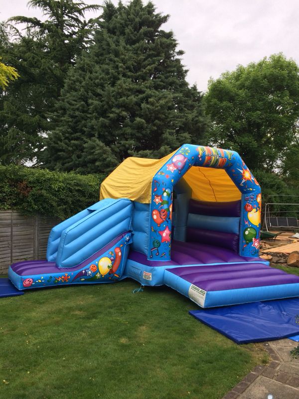 bouncy castle with slide to hire