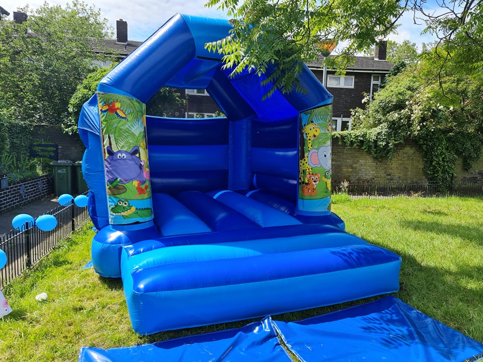 Light / Dark Blue Jungle Castle Inflatables Hire in London, greenwich , charlton, lewisham