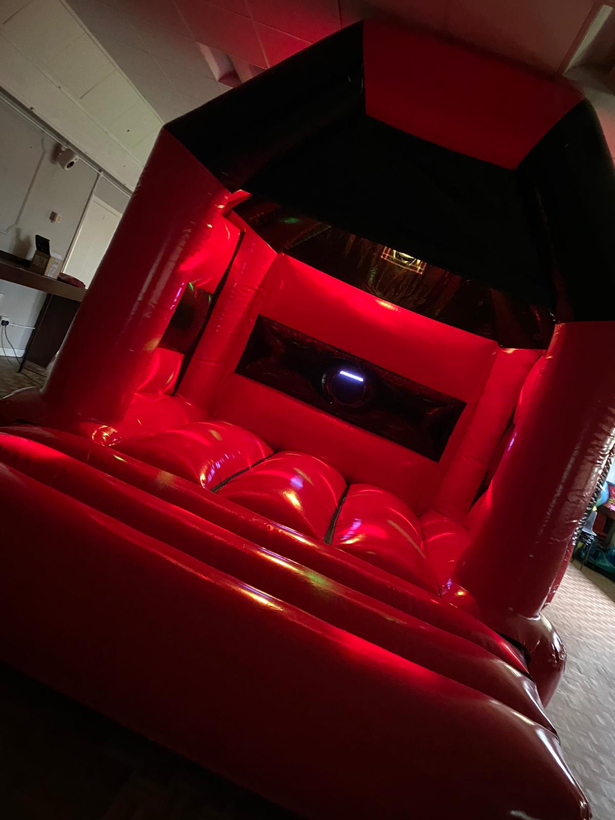 Red & Black Disco Bouncy Castle Liverpool Manchester & More Red & Black Disco Bouncy Castle Liverpool Manchester & More