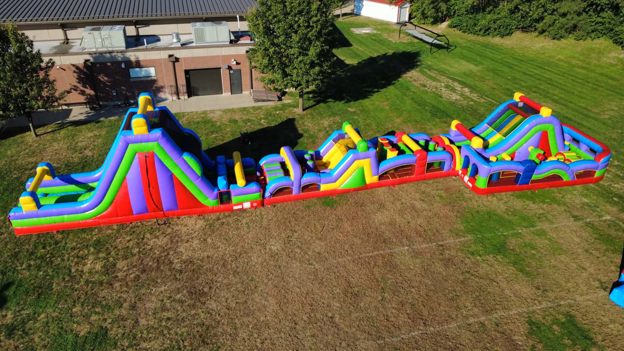 Trackless Train For Rent 110-Foot Retro Obstacle Course - Inflatable and Amusement ride Rentals ...