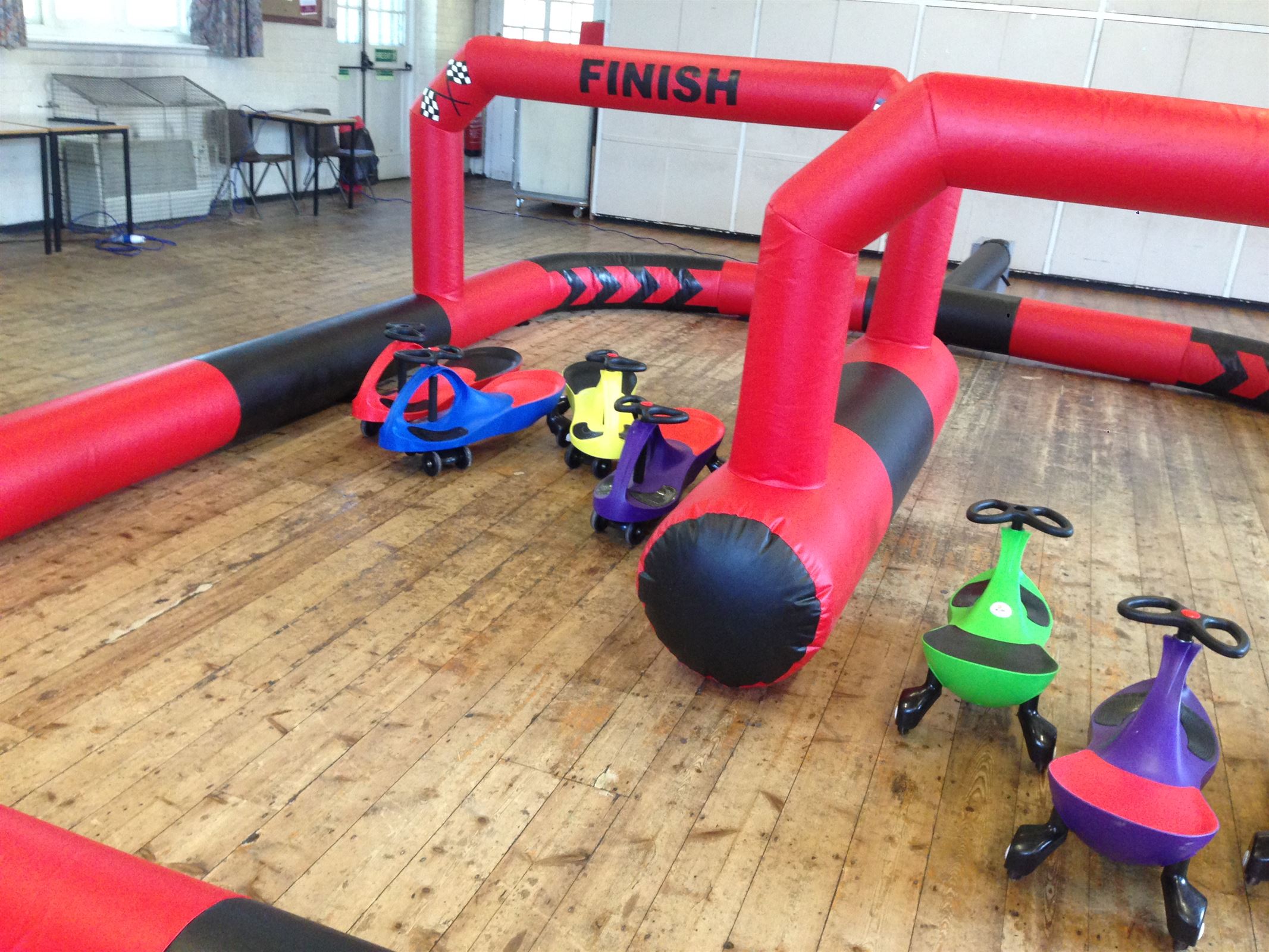 The 20 ft by 16 ft Inflatable Car Track Mobile Soft Play Hire London
