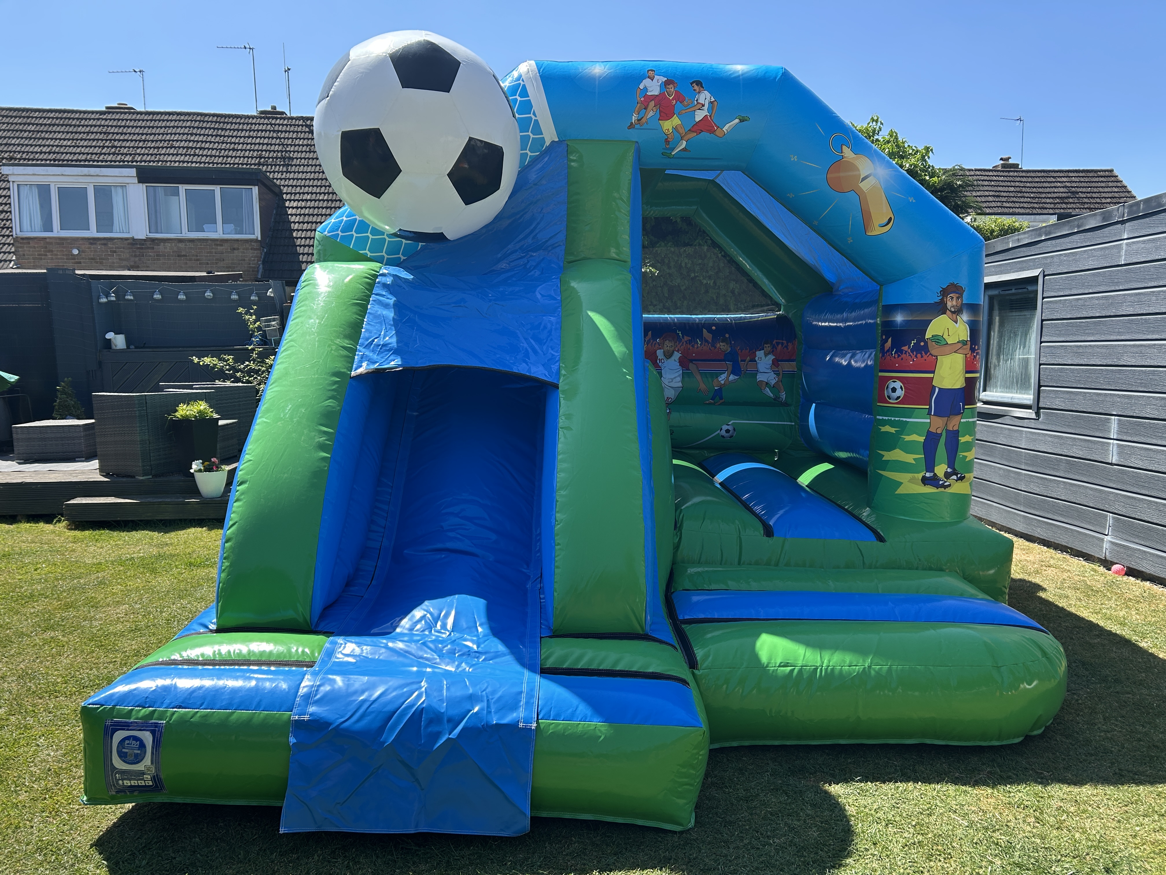 3D Football Themed Bouncy Castle with slide - Bouncy Castle Hire in