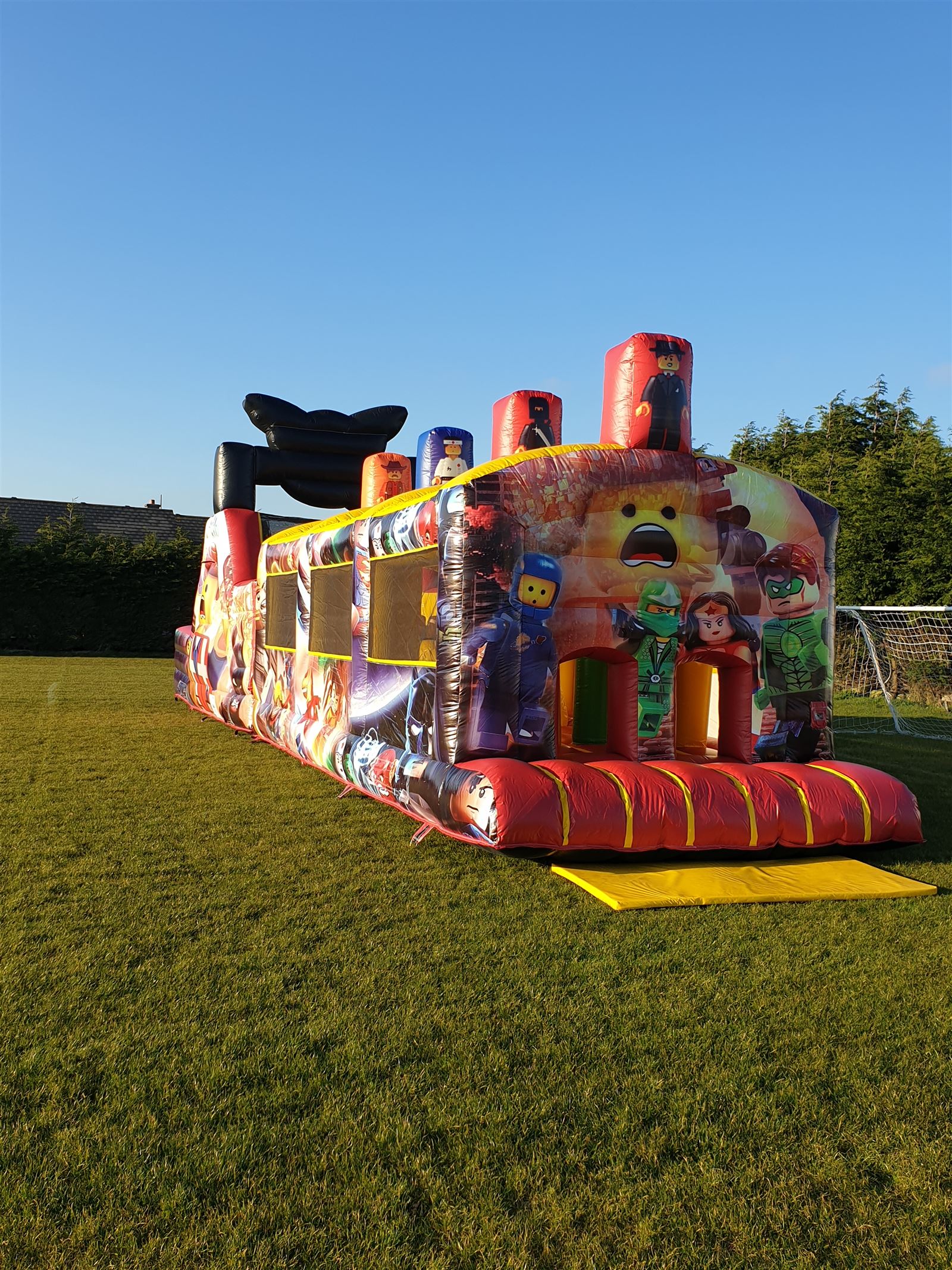 Lego Movie 50ft Obstacle course Bouncy Castle Hire in Wexford